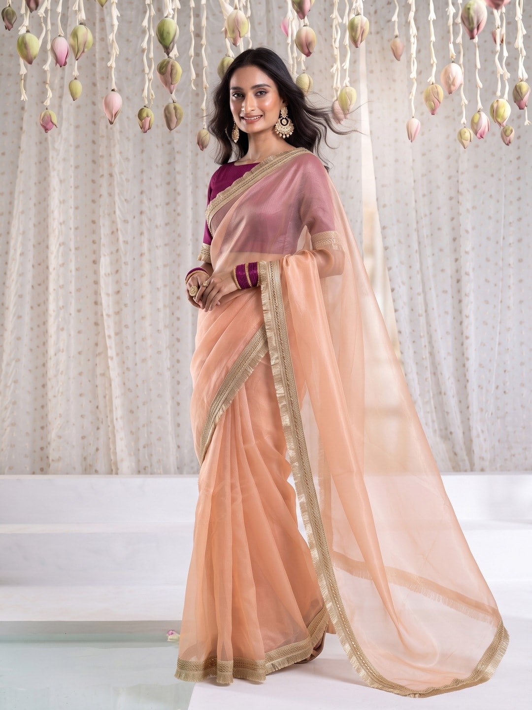 Peachmode Peach Tissue Organza Saree With Gold Fringe Lace Border - Image 1