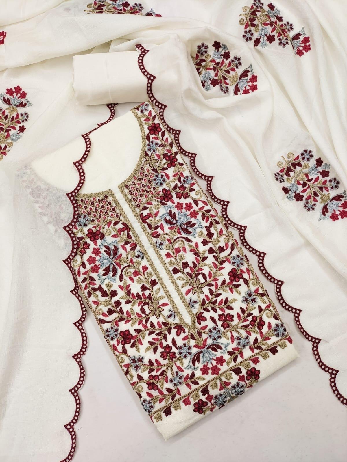 Peachmode White Vichitra Silk Unstitched Dress Material With Maroon Floral Panel Embroidery And Scalloped Cutwork Dupatta - Image 1