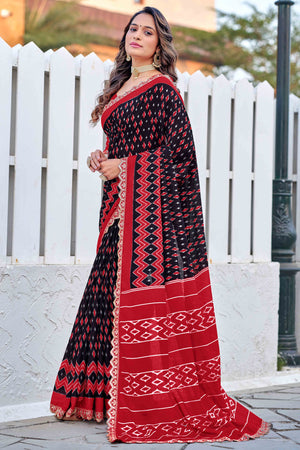 Mulmul Cotton Black & Red Ikkat Saree with Embroidered Lace Detailing