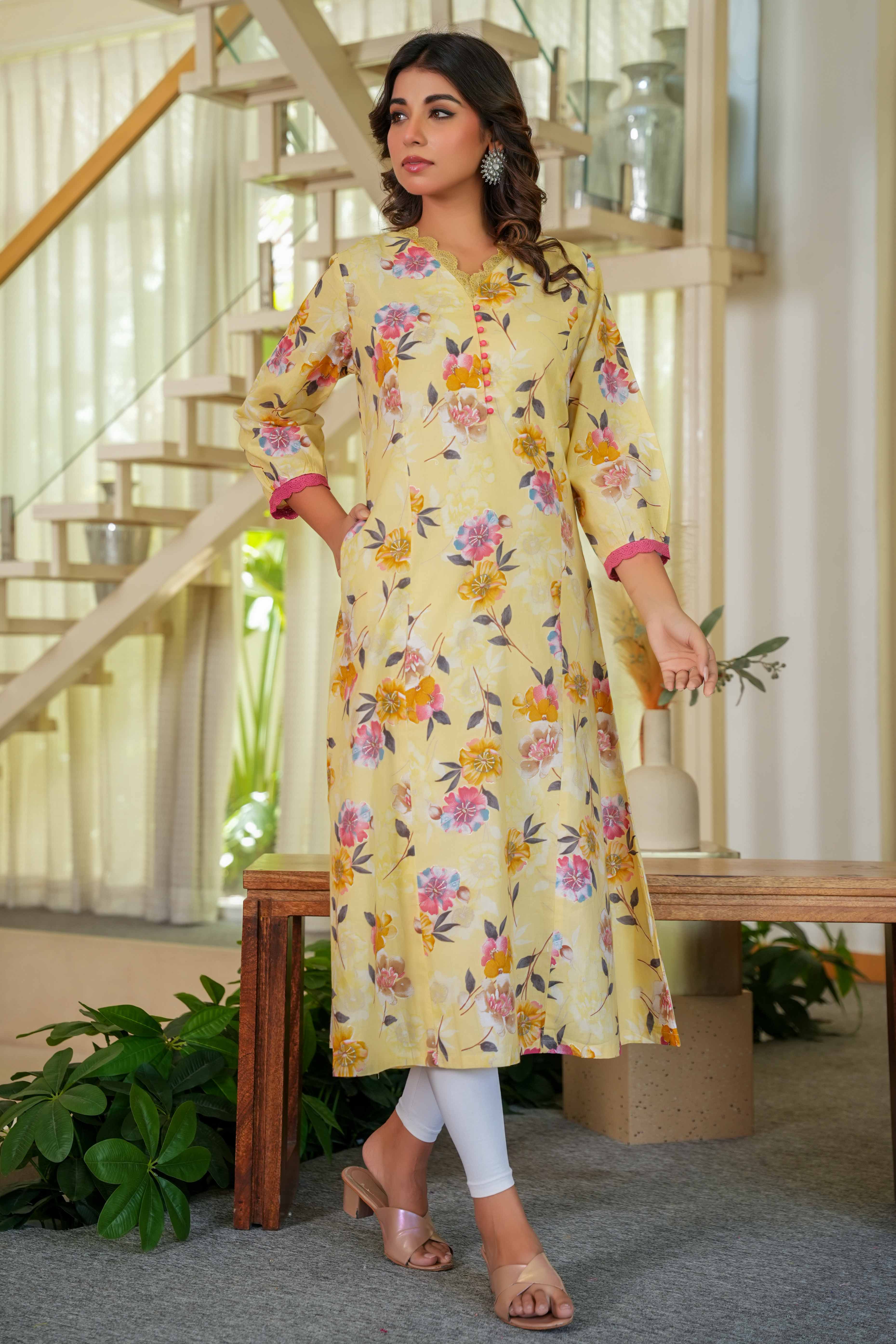 Pure Cotton Yellow Kurti with Feminine Floral Prints and Straight Cut Design