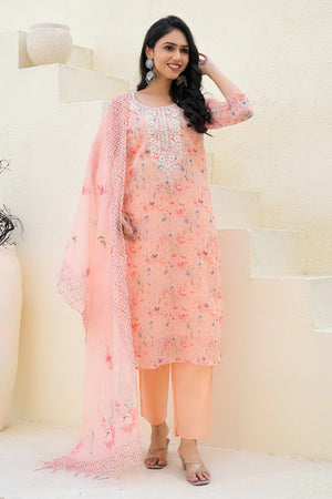 Graceful Peach Floral Printed Suit in Linen with Delicate Chikankari Embroidery