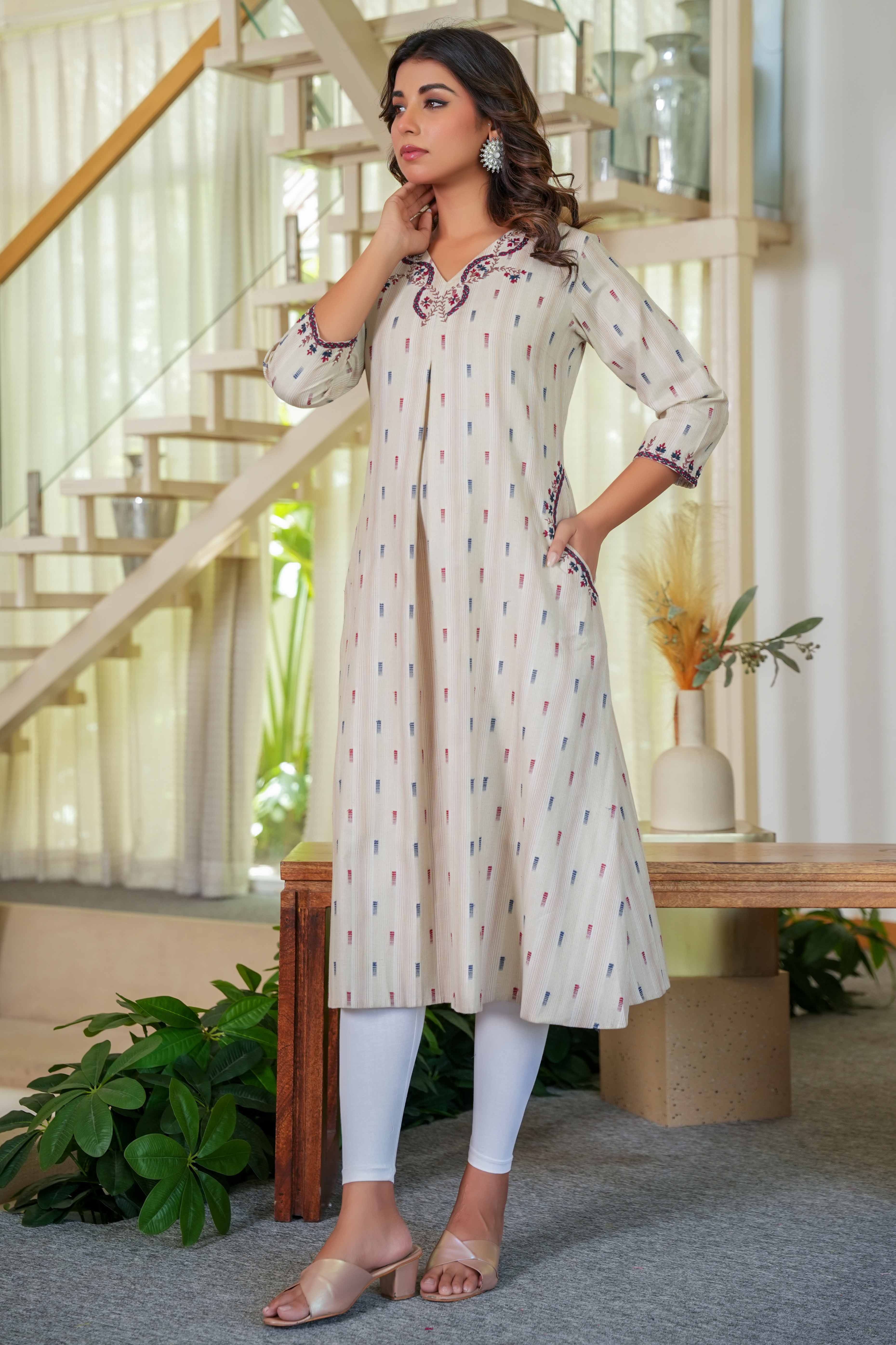 Chic Beige A-Line Pure Cotton Woven Kurti Highlighted with Embroidered Neckline