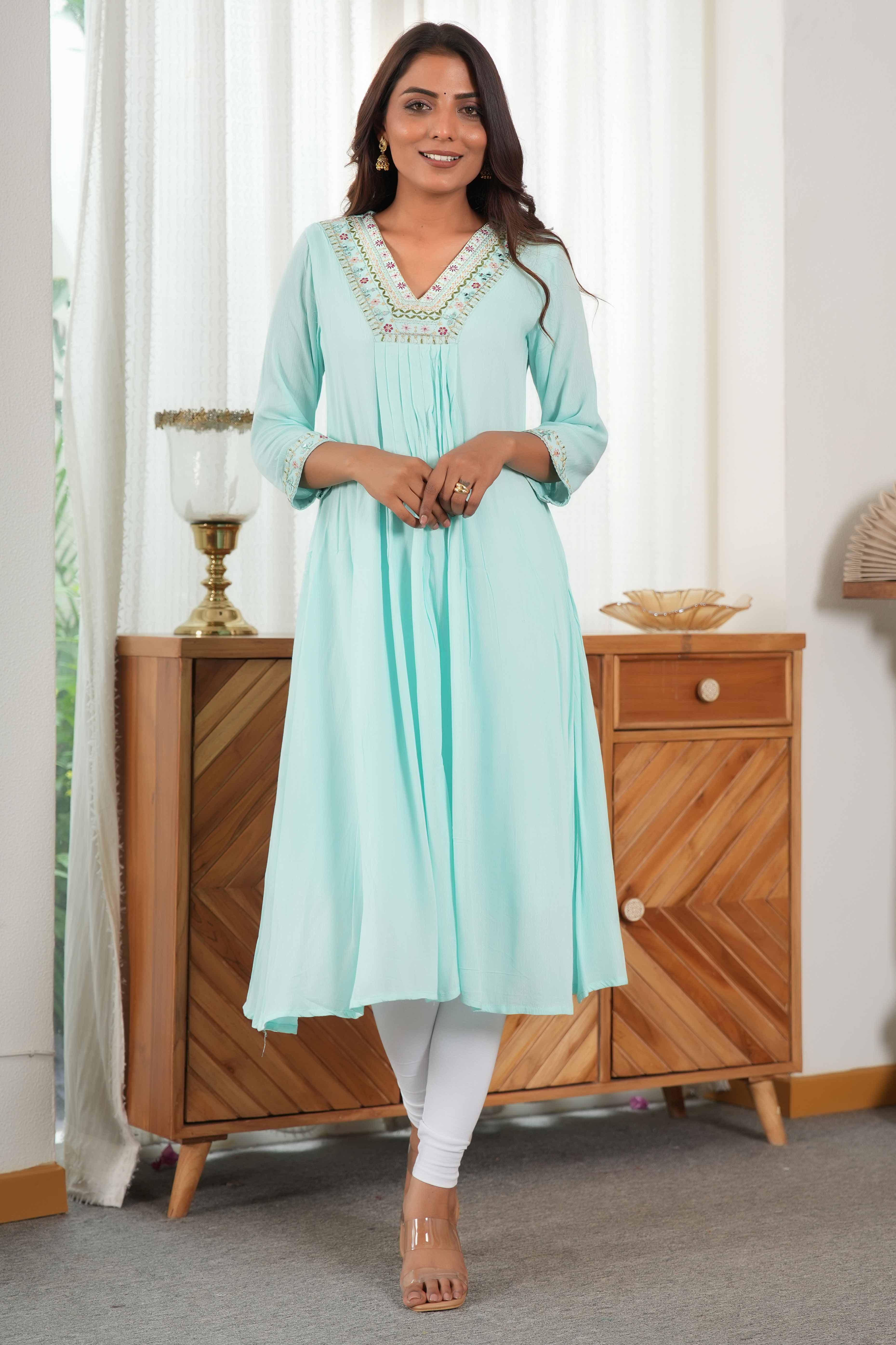 Soft Sky Blue Rayon A-Line Dress Accented with Fine Neck Embroidery Soft Sky Blue Rayon A-Line Dress Accented with Fine Neck Embroidery
