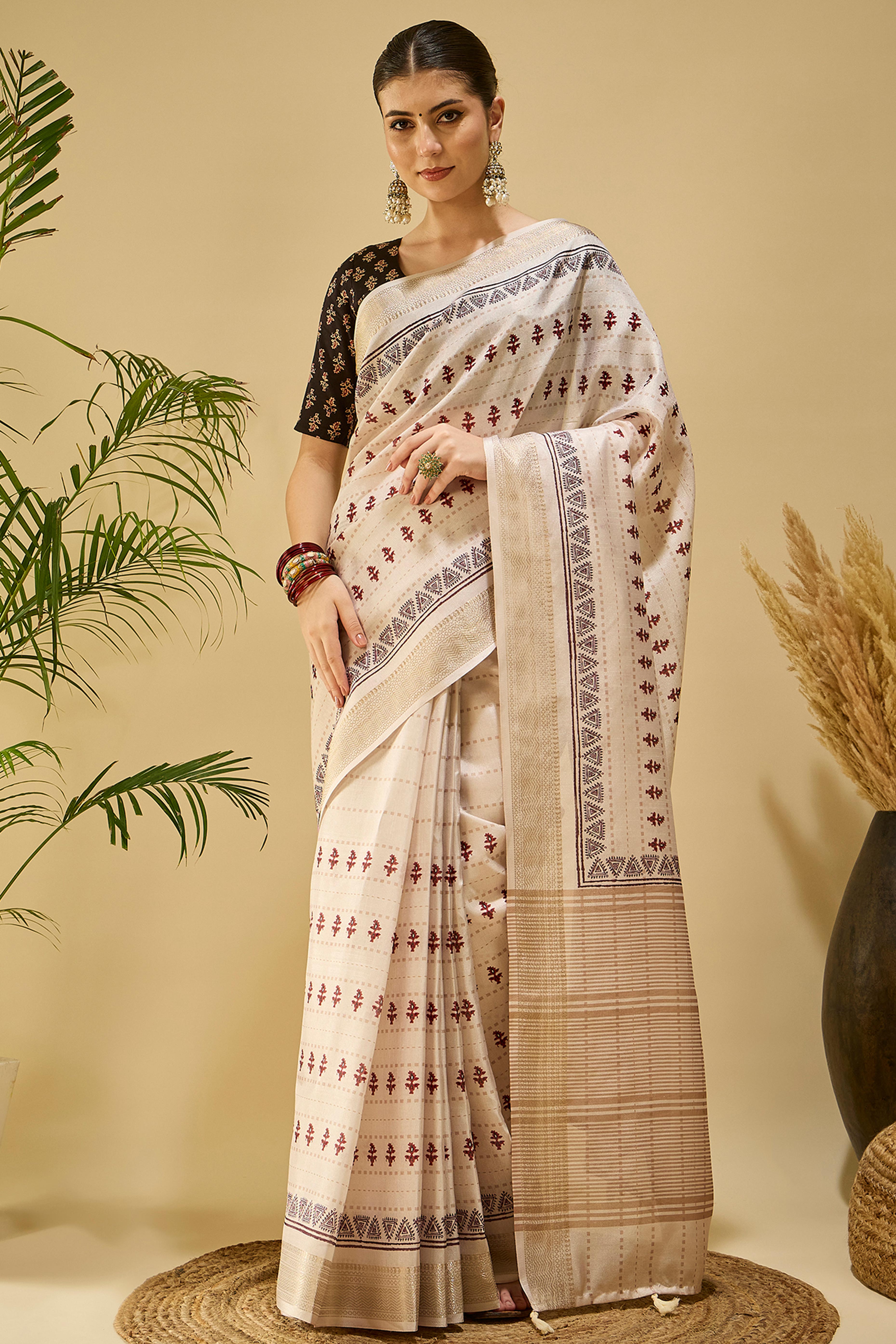 Elegant Cream Katki Cotton Silk Saree With Delicate Floral Prints & Tassel Pallu