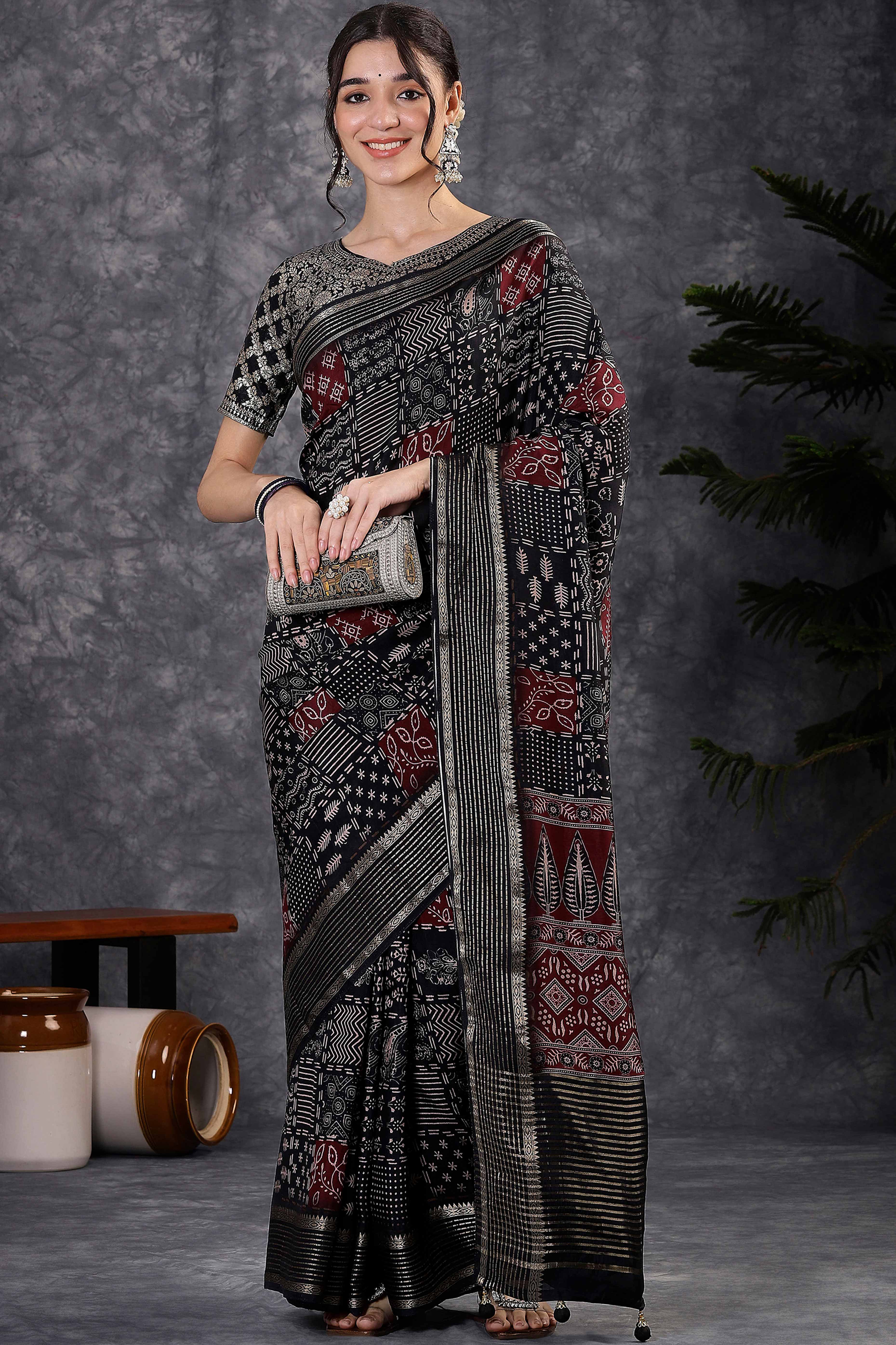 Black Dola Silk Saree Featuring Abstract Print & Jacquard Border