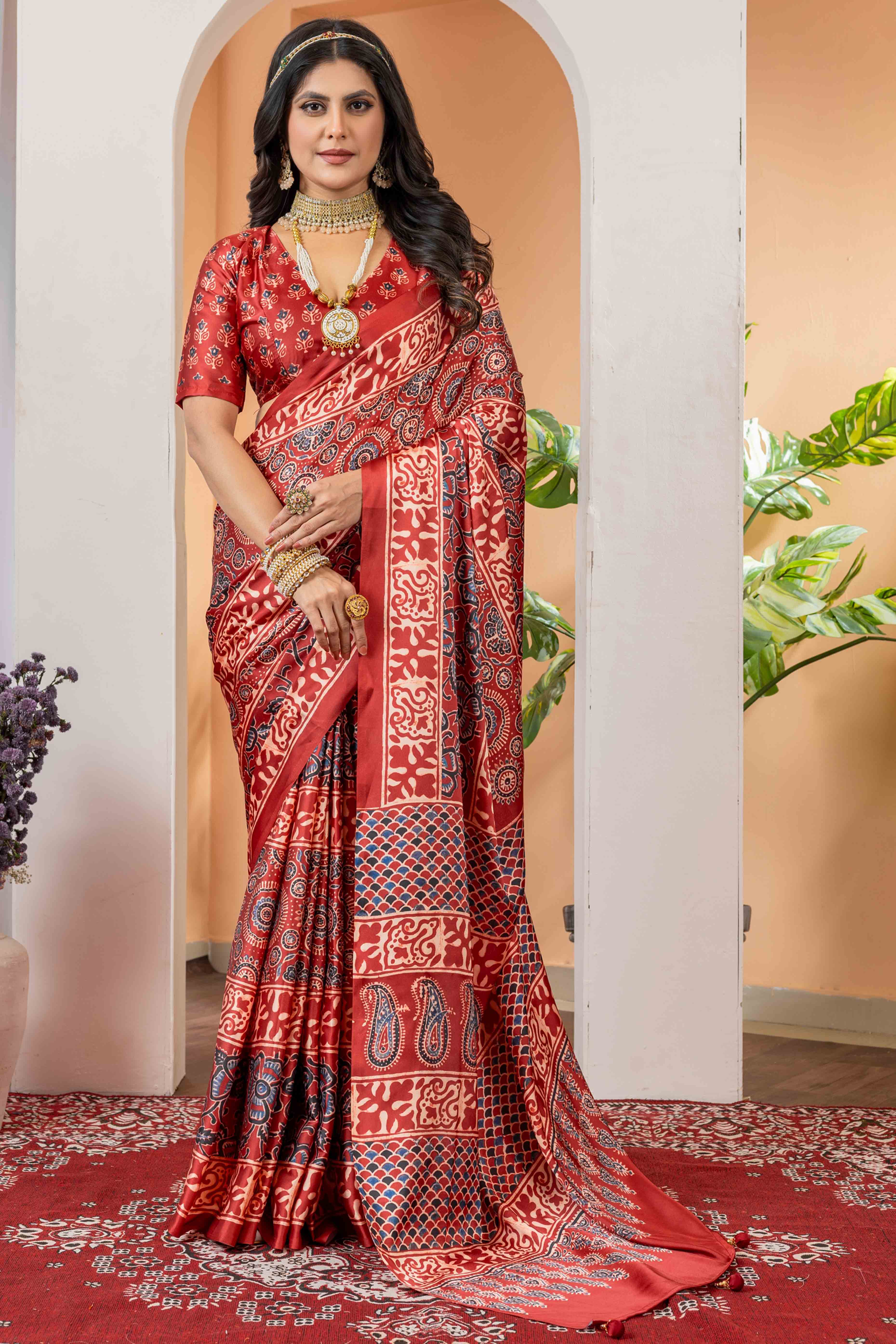 Elegant Red Satin Saree with Floral Patterns