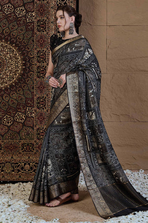 Black Viscose Saree Featuring Delicate Floral Prints and a Rich Zari Border