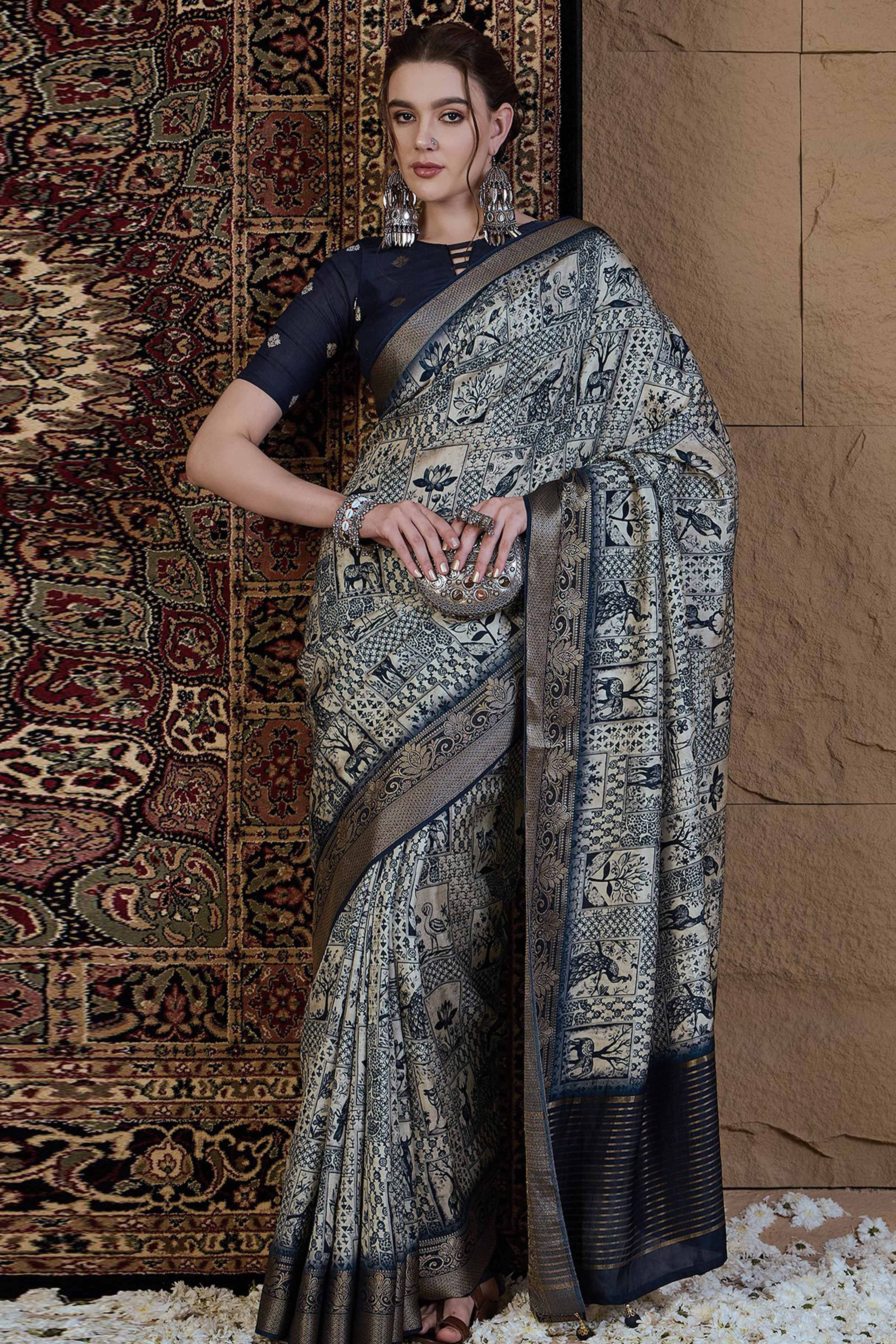 Beige Viscose Saree Featuring Delicate Floral Prints and a Rich Zari Border
