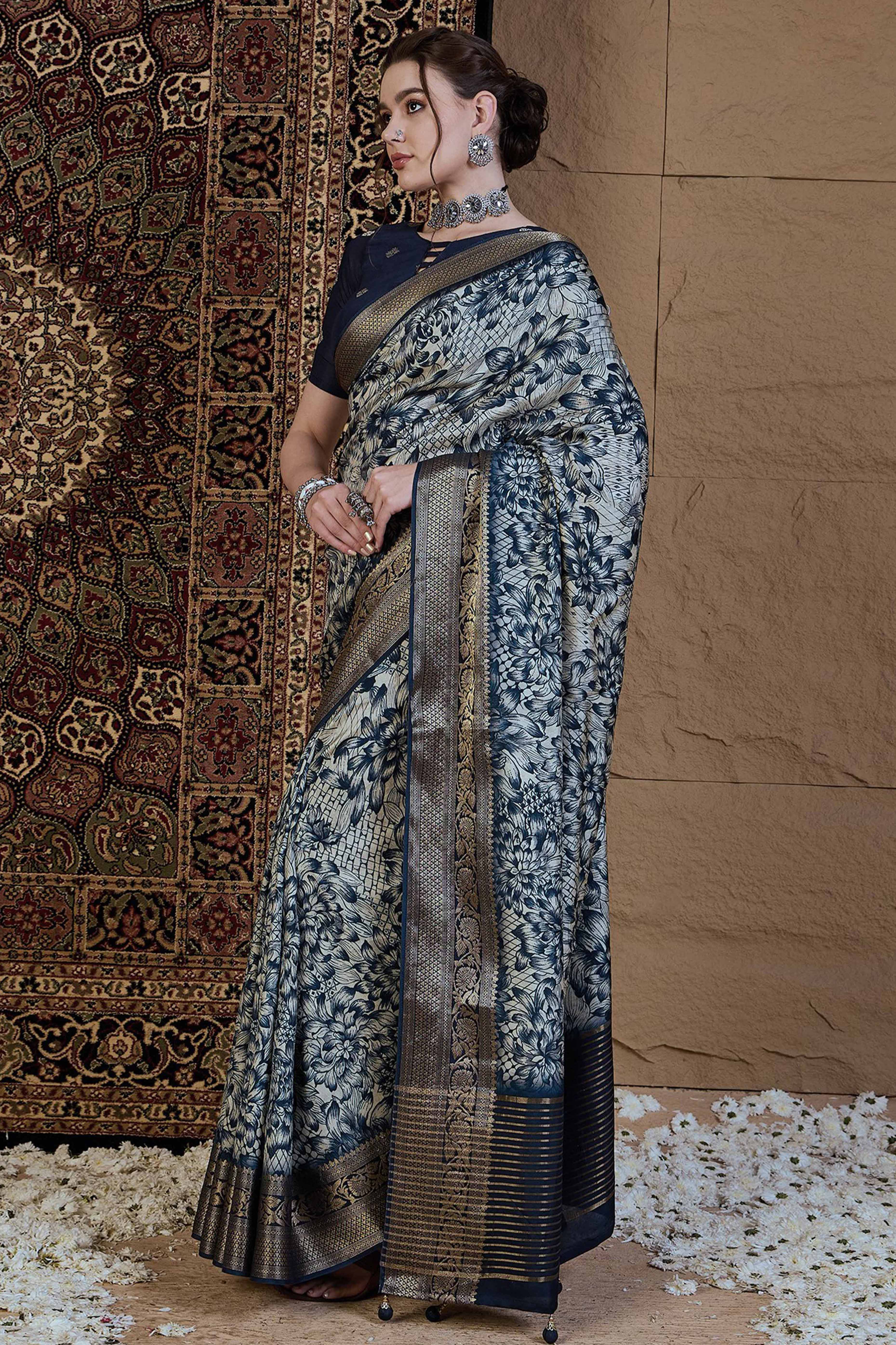 Floral Elegance in Off White Viscose Saree with Subtle Prints and Rich Zari Weave