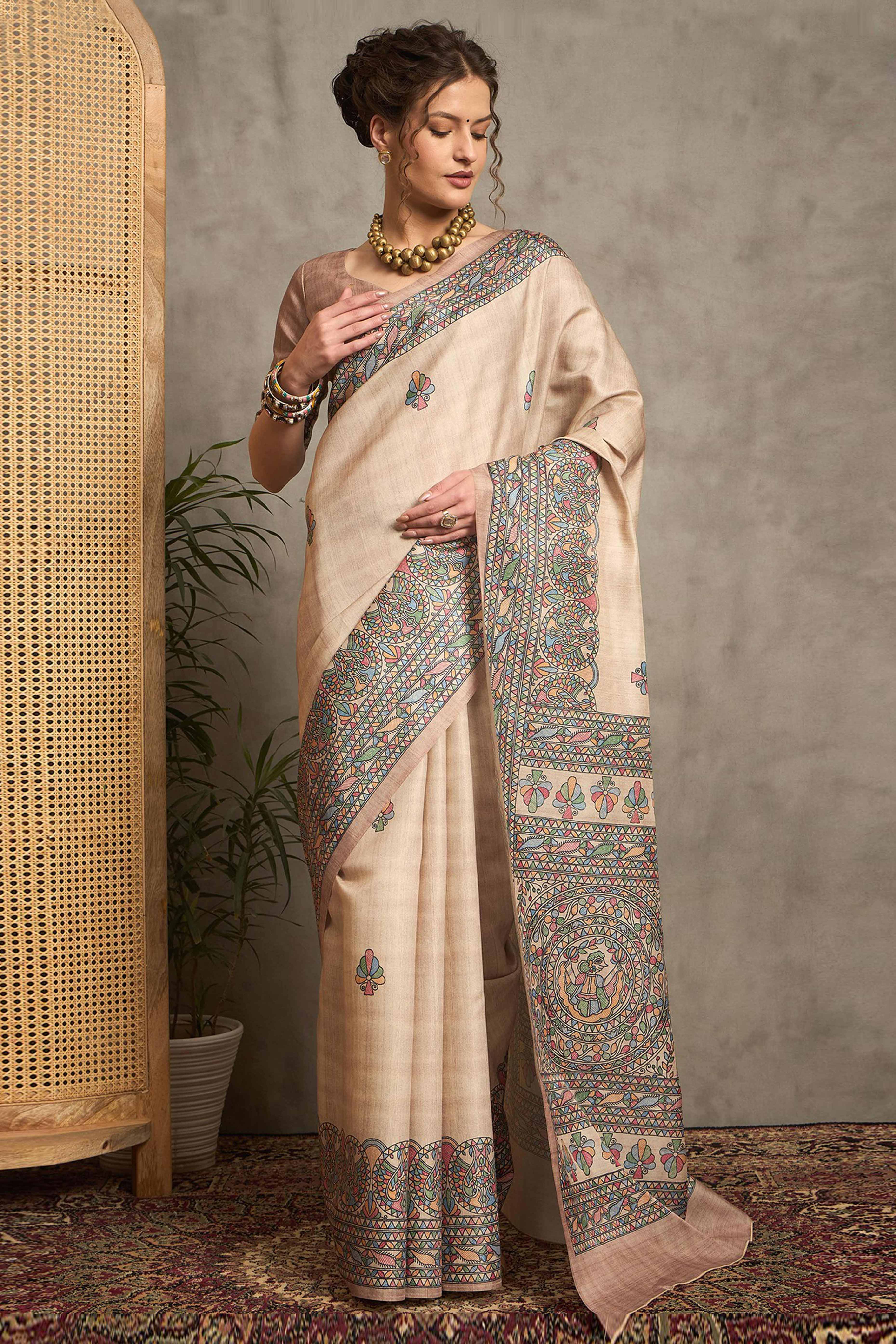 Elegant Cream Art Silk Saree Adorned with Traditional Madhubani Art-Inspired Prints