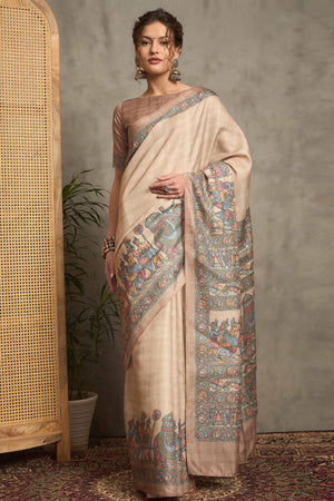 Cream Colored Art Silk Saree Featuring Artistic Madhubani Motifs