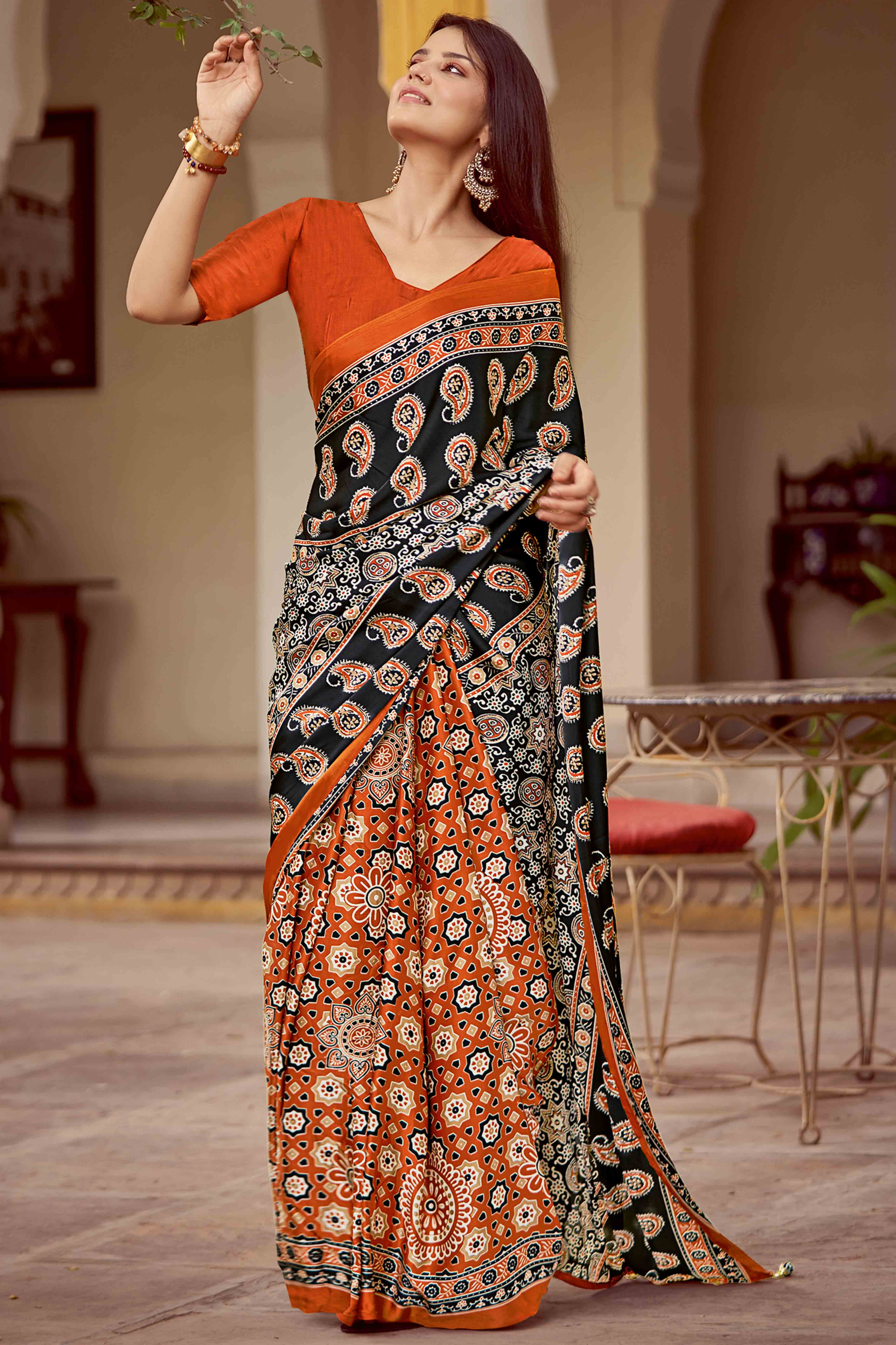 Orange & Black Floral Ajrakh Printed Satin Saree With Tassels