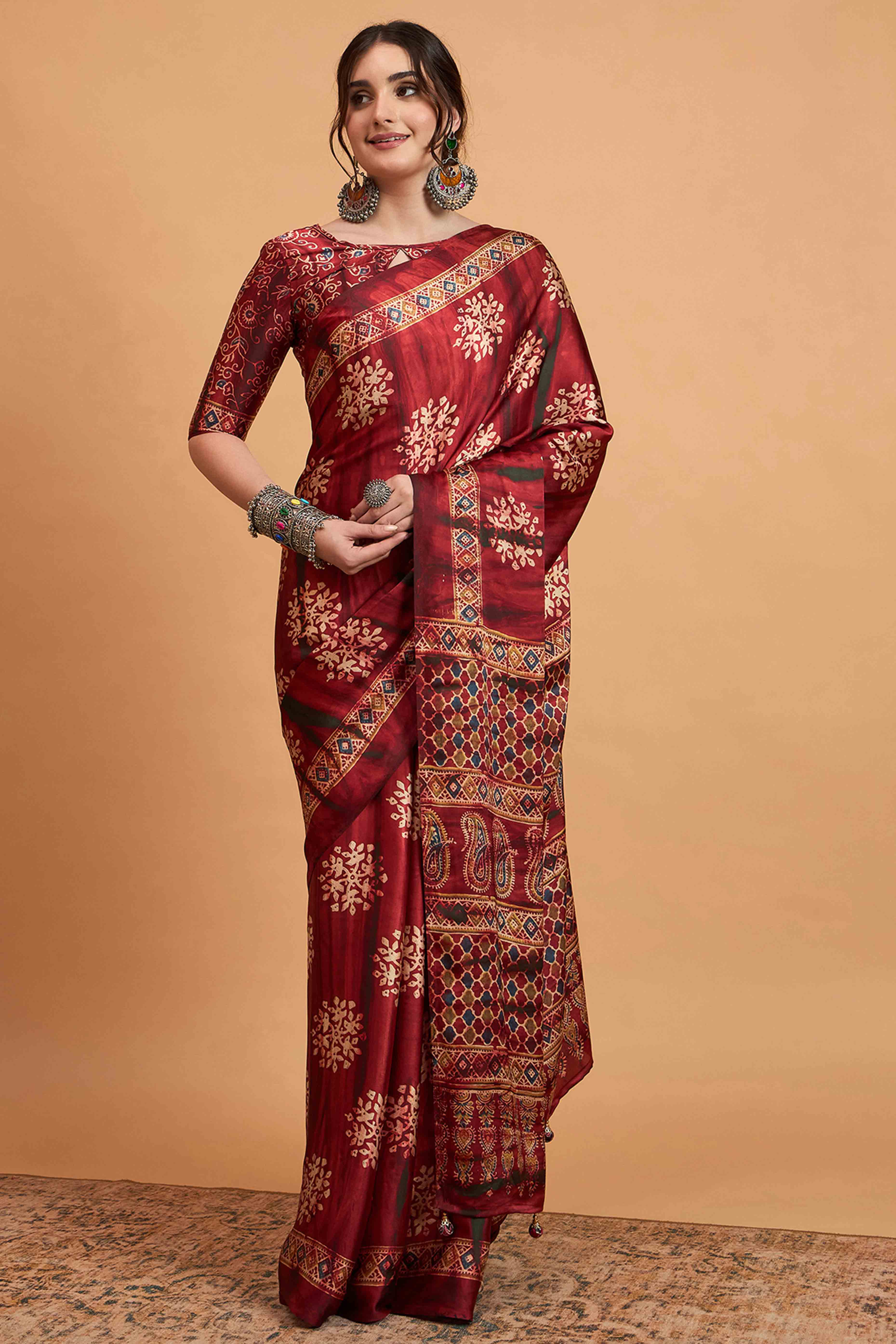 Red Floral Ajrakh & Batik Print Saree In Luxurious Modal Satin With Tassel Pallu