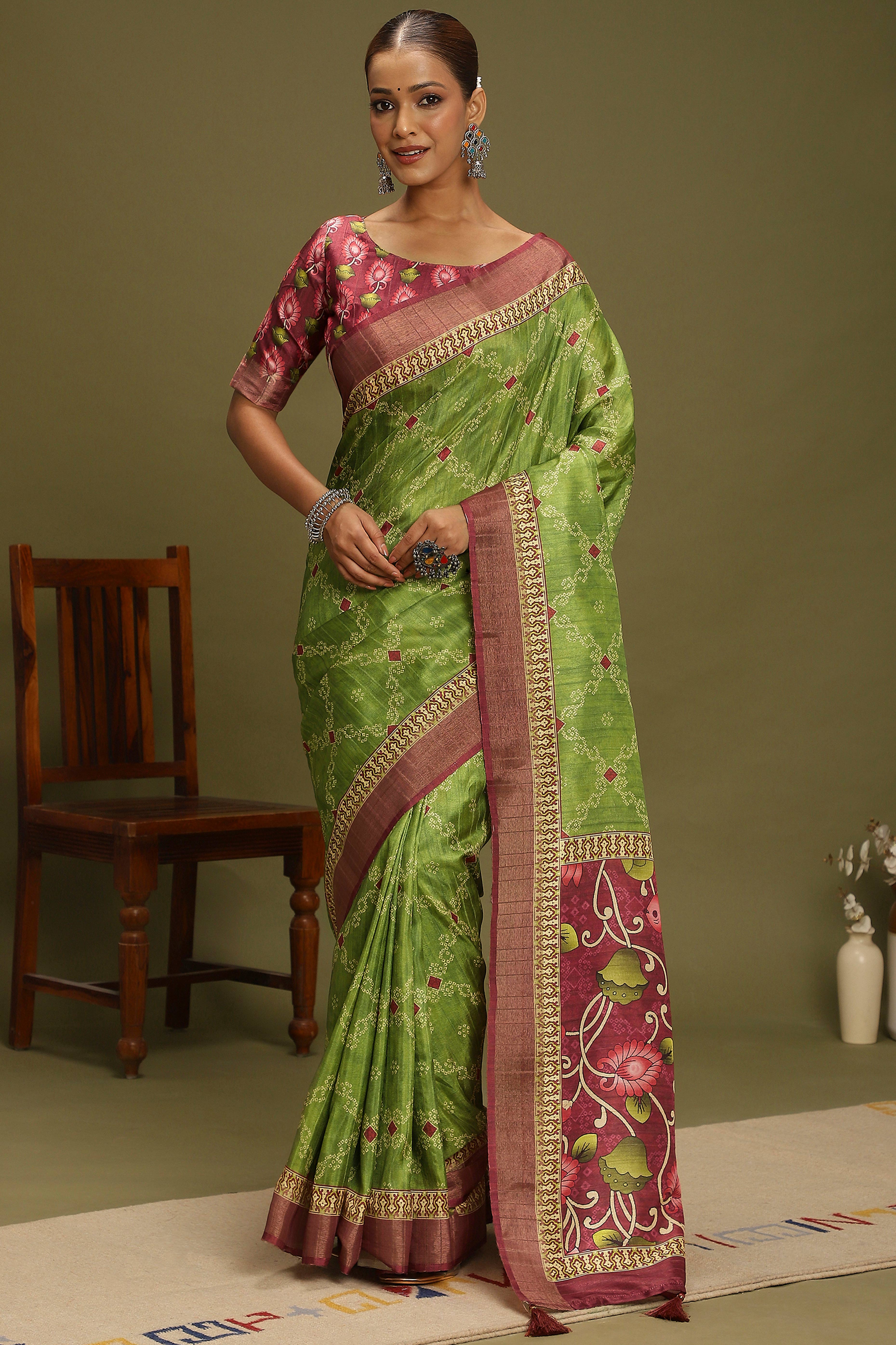 Green Silk Blend Saree Decorated with Vibrant Bandhani Prints and Festive Detailing