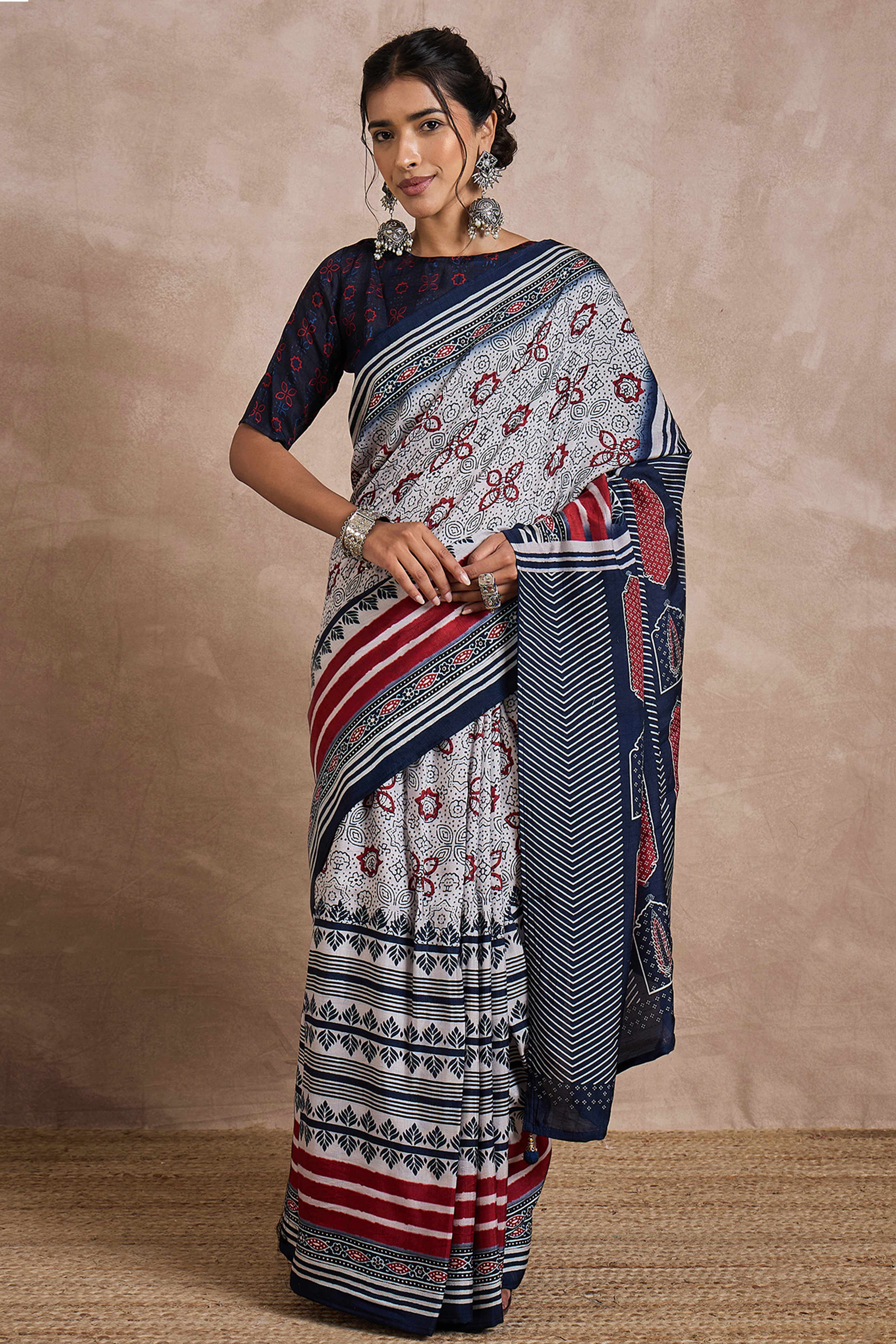 White Dola Silk Saree Featuring Heritage Ajrakh Prints for Celebratory Occasions