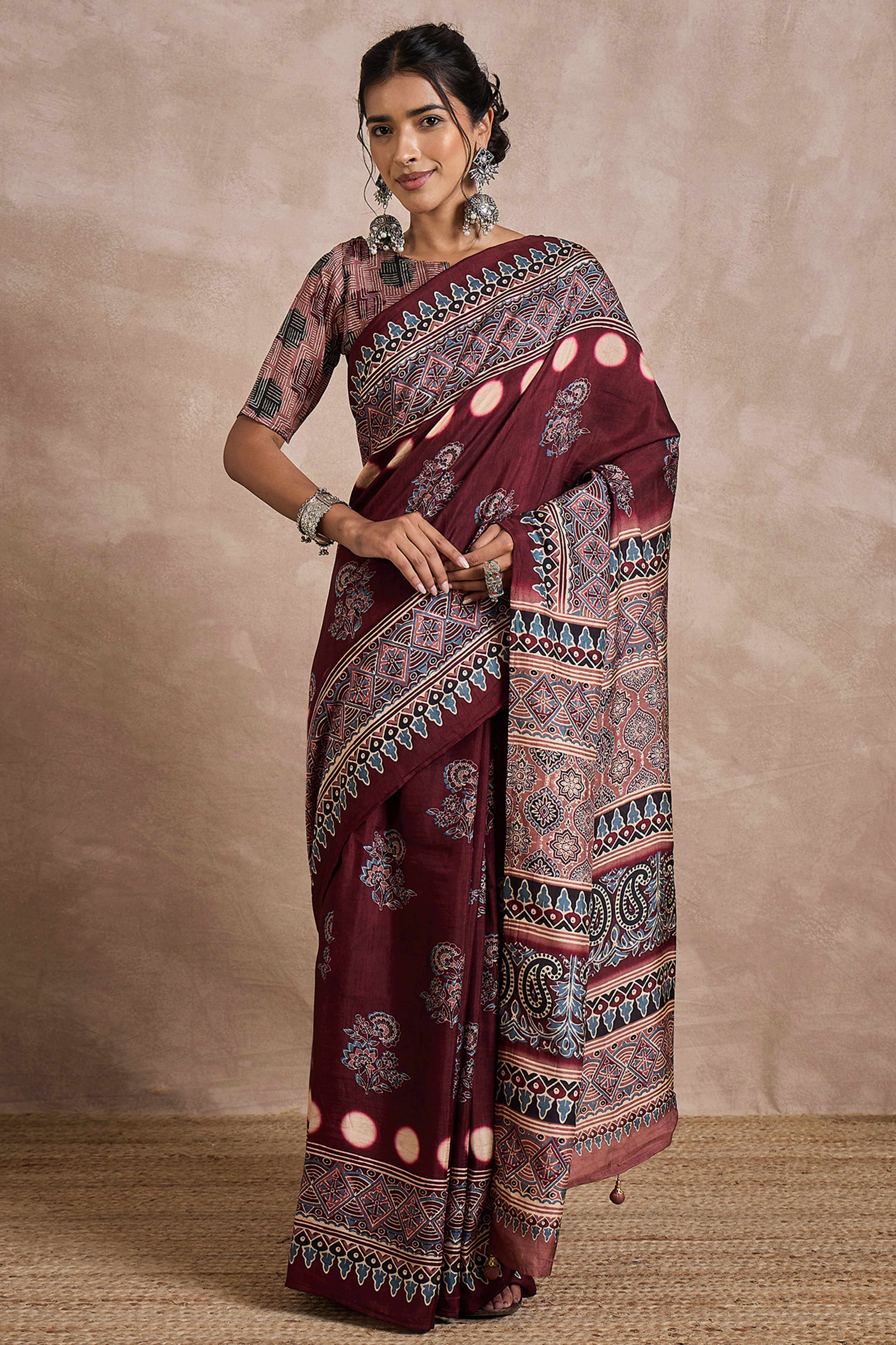 Dark Brown Dola Silk Saree Featuring Heritage Ajrakh Prints for Celebratory Occasions