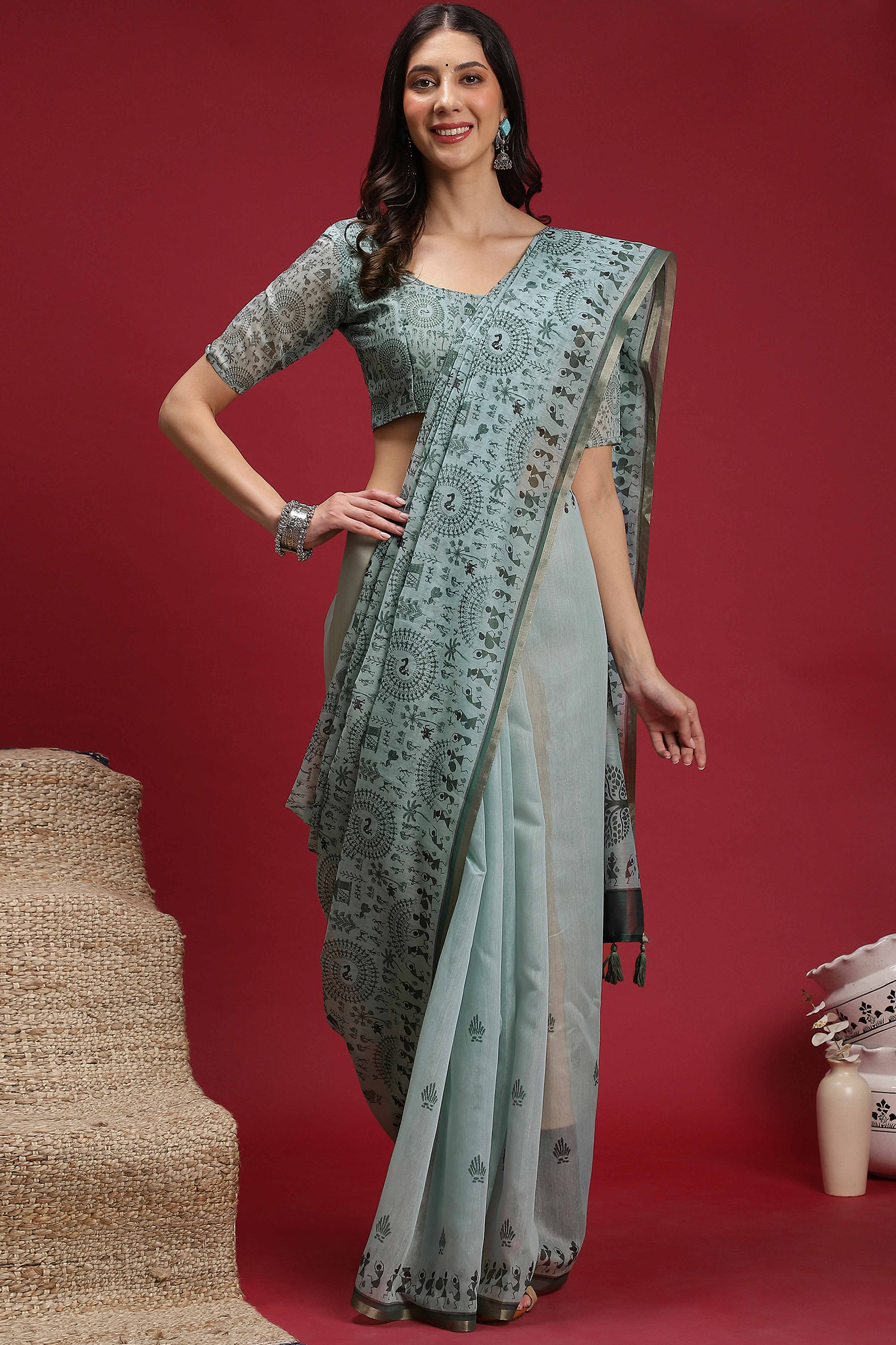 Pastel Blue Linen Cotton Saree Featuring Traditional Warli Prints & Tassel Pallu