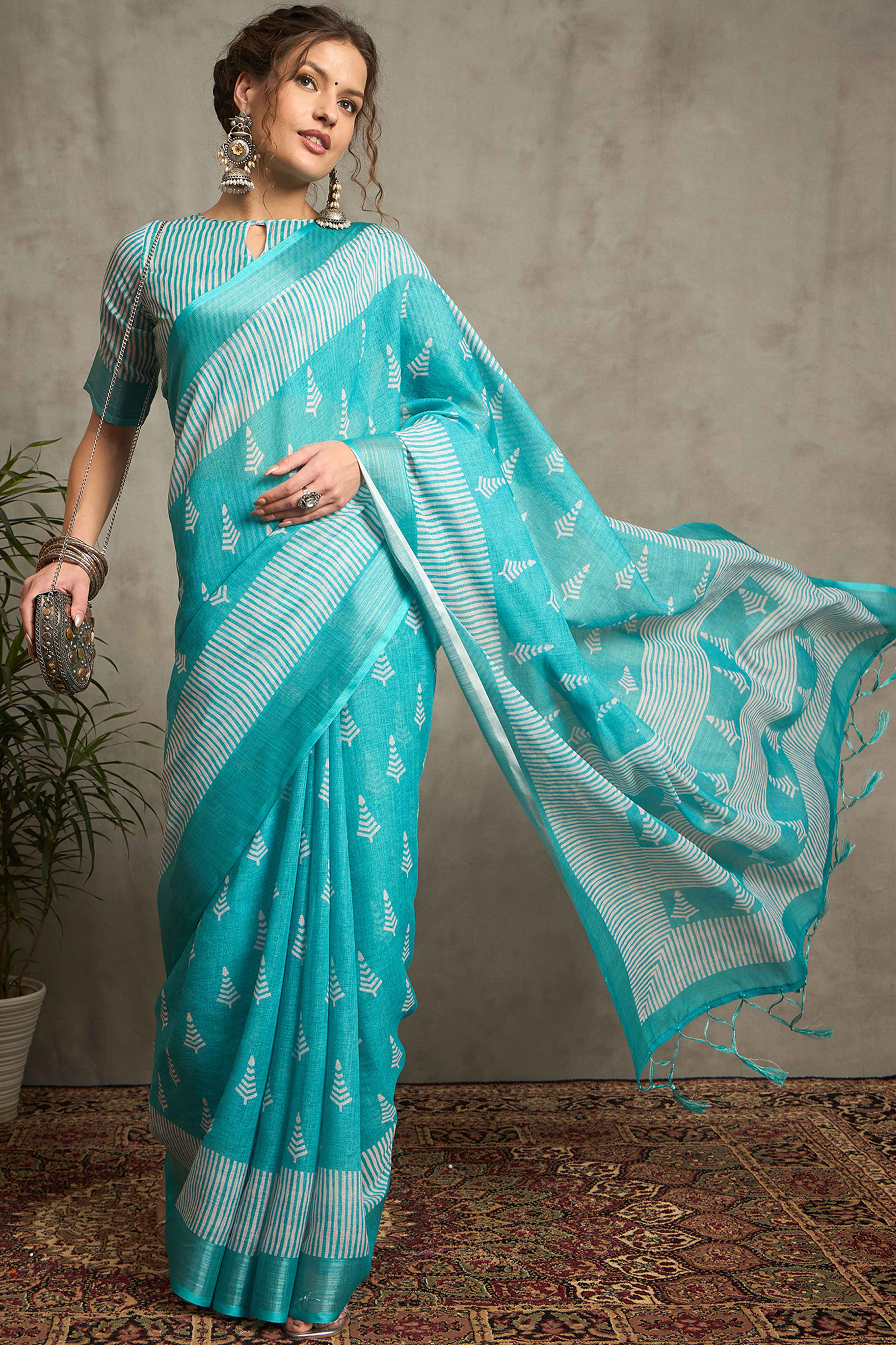 Turquoise Pure Linen Saree with Intricate Zari Work