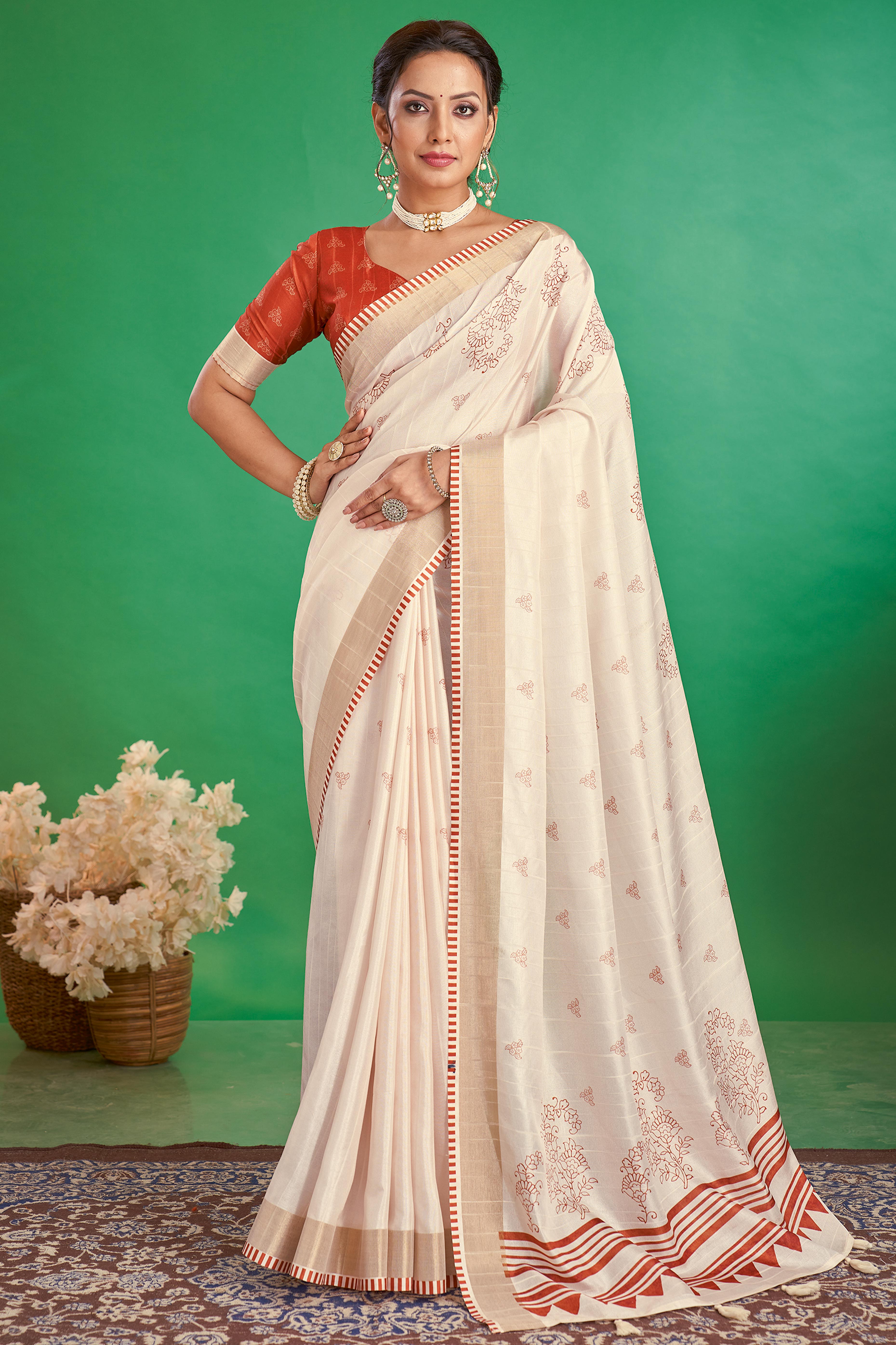 Charming Offwhite & Rust Floral Printed Kotha Cotton Silk Saree Adorned With Graceful Tassel Pallu