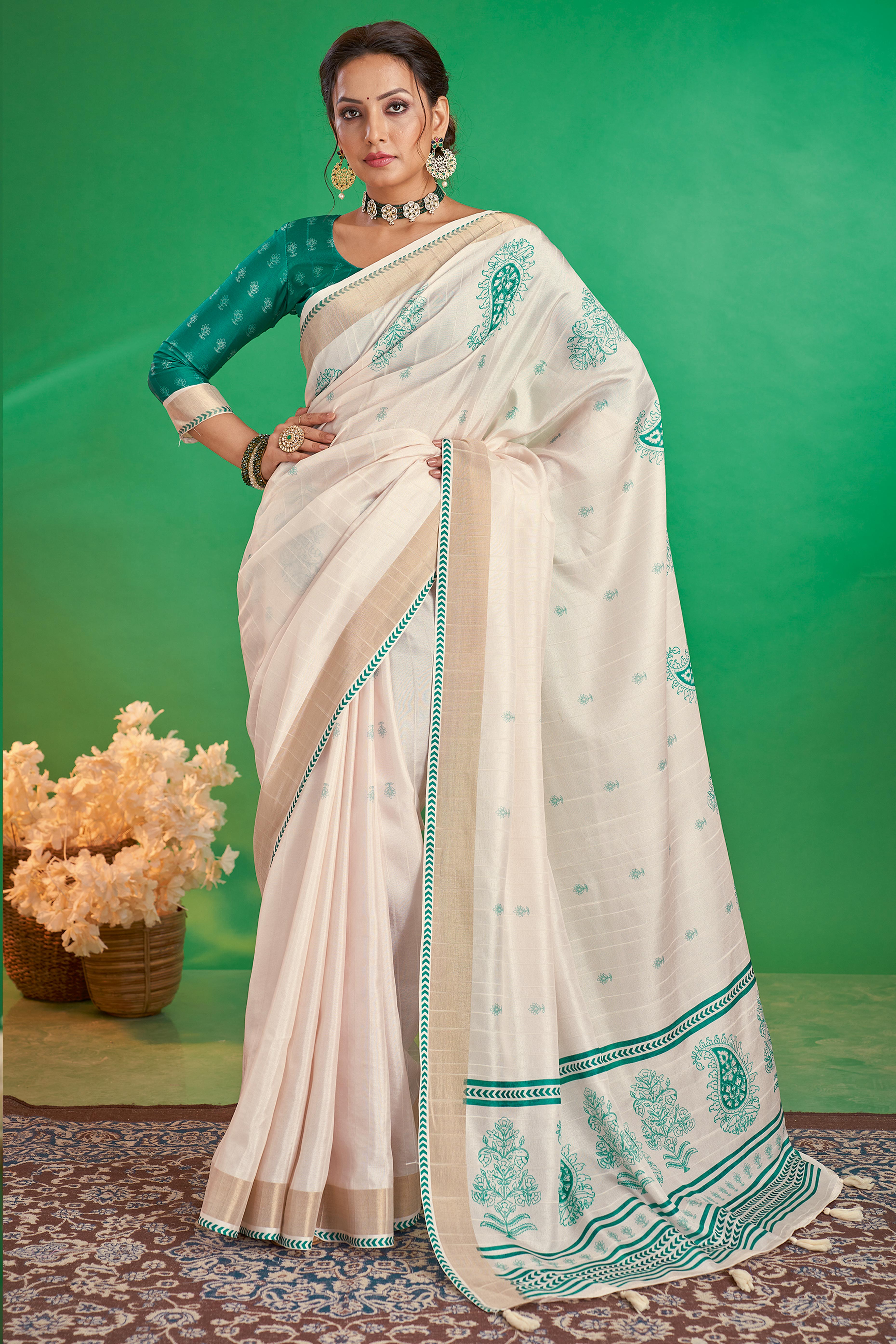 Charming Offwhite & Rama Floral Printed Kotha Cotton Silk Saree Adorned With Graceful Tassel Pallu