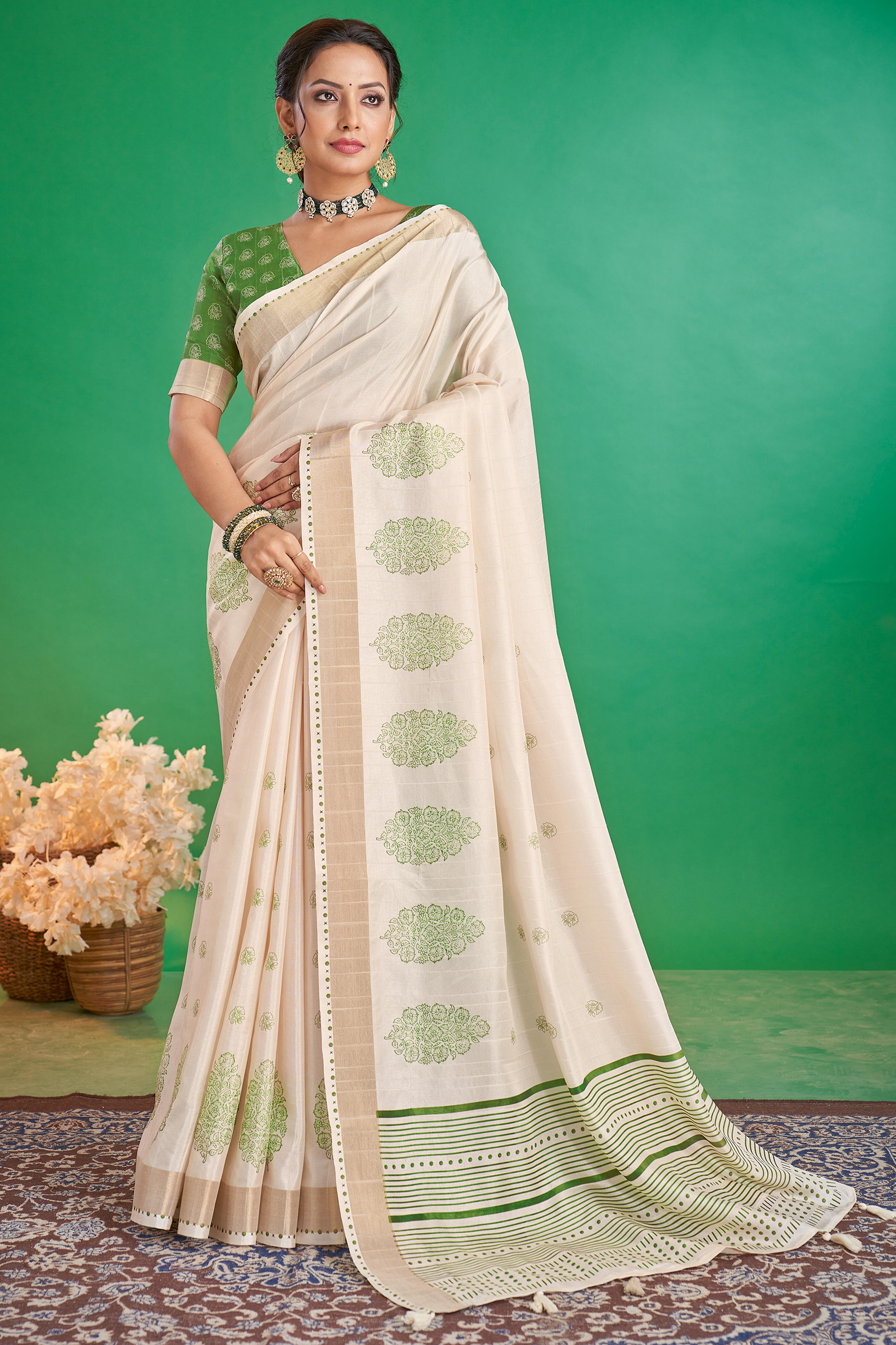 Charming Offwhite & Green Floral Printed Kotha Cotton Silk Saree Adorned With Graceful Tassel Pallu