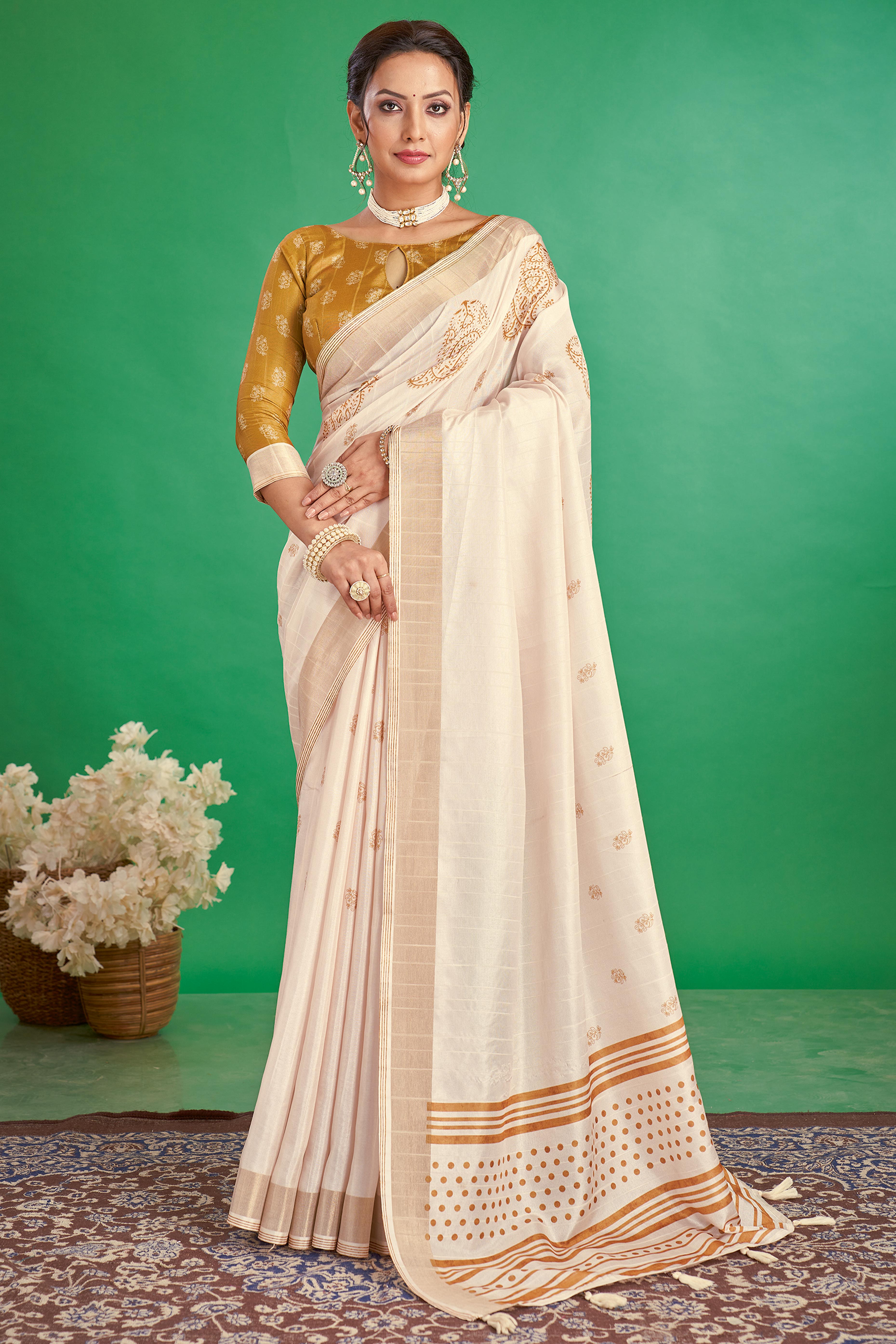 Charming Offwhite & Mustard Floral Printed Kotha Cotton Silk Saree Adorned With Tassel Pallu