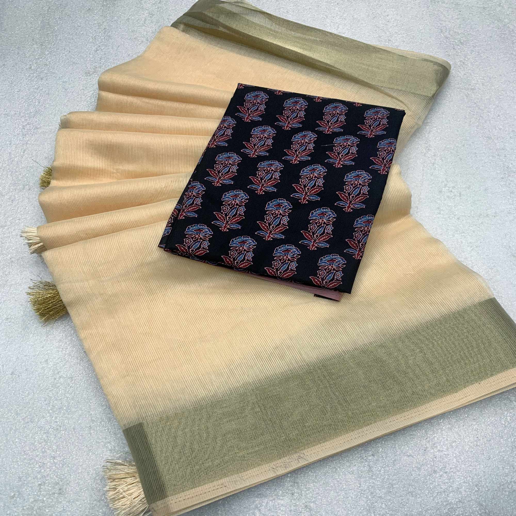 Beige Woven Solid Cotton Silk Saree With Tassels