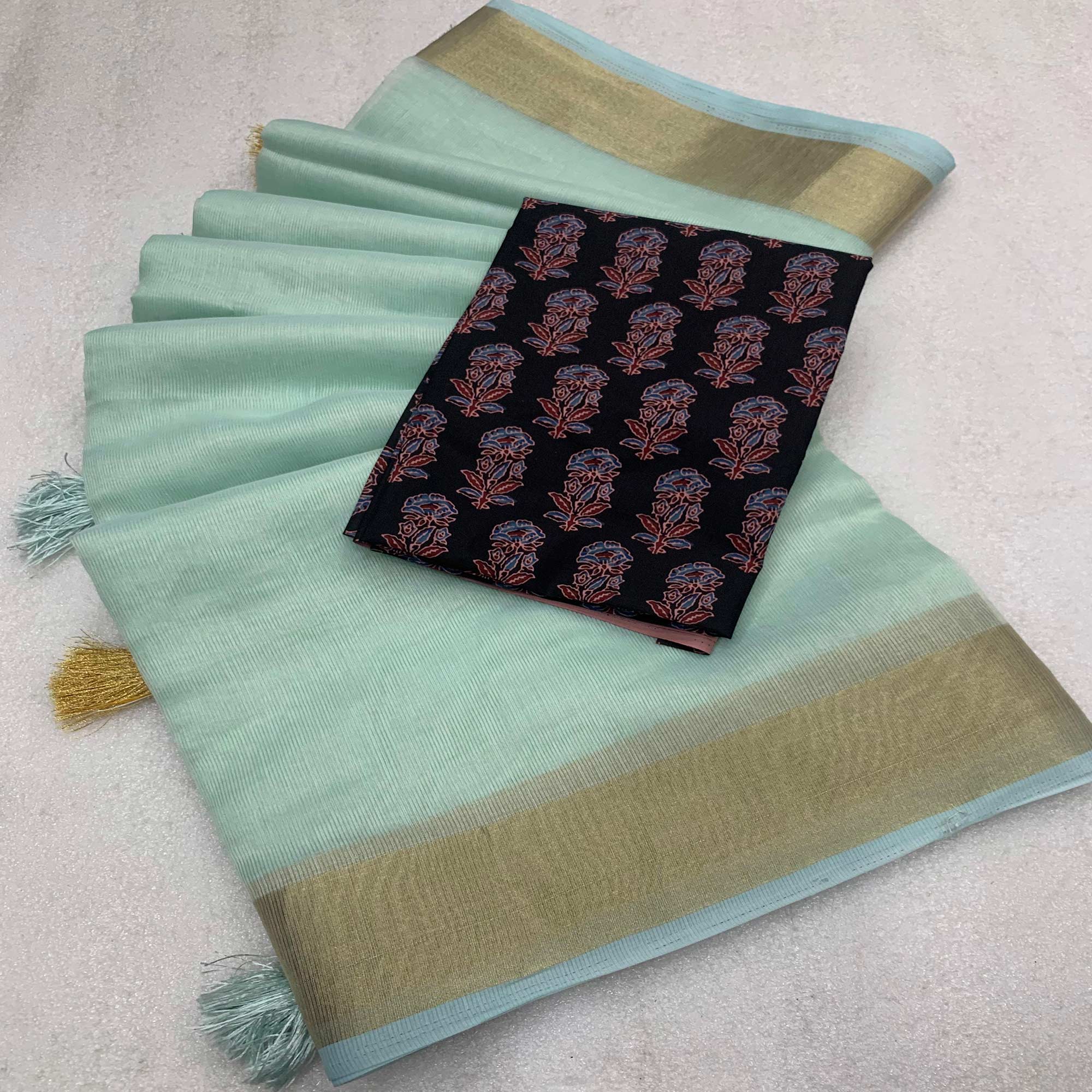 Sea Green Woven Solid Cotton Silk Saree With Tassels