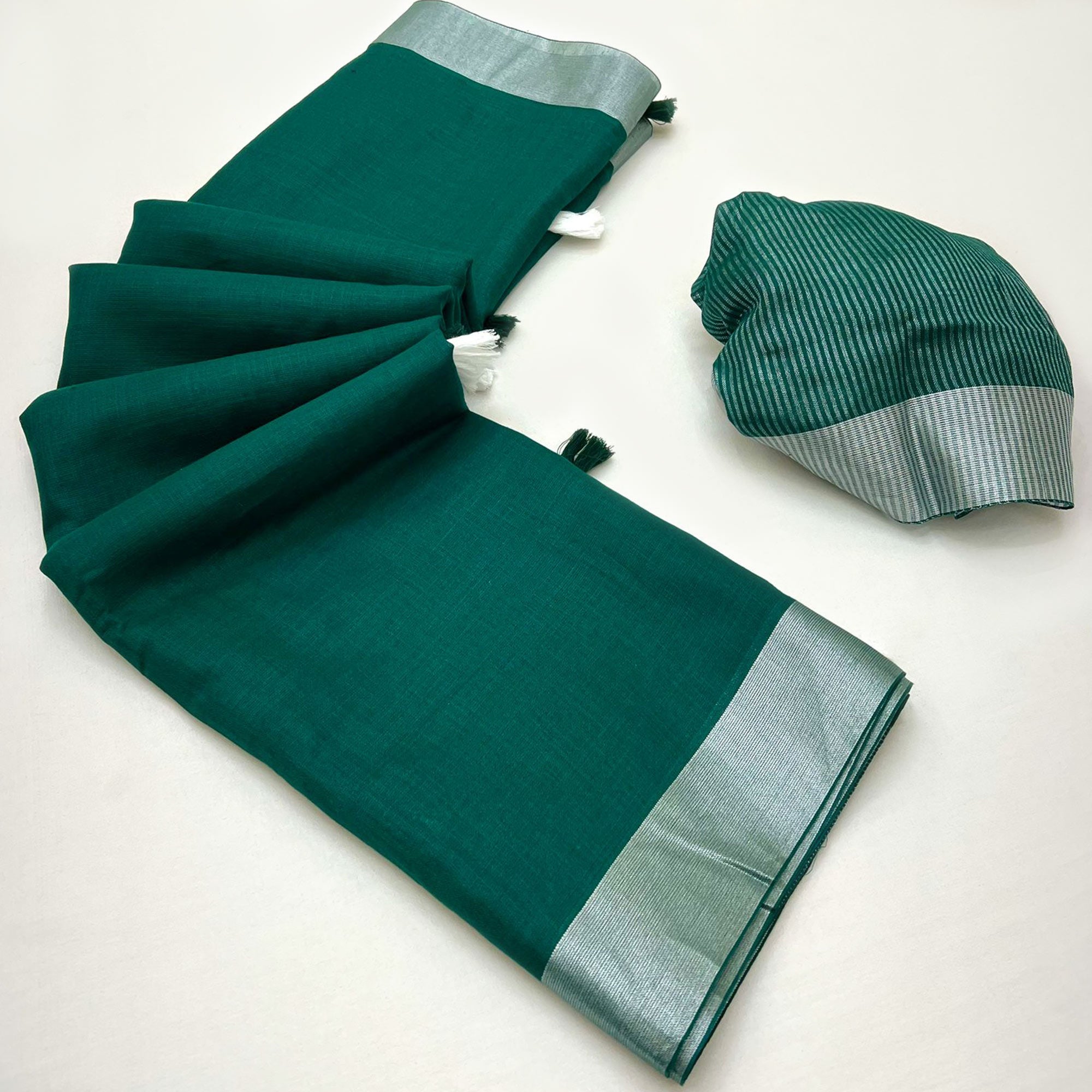 Green Solid Pure Linen Saree With Zari Woven Border