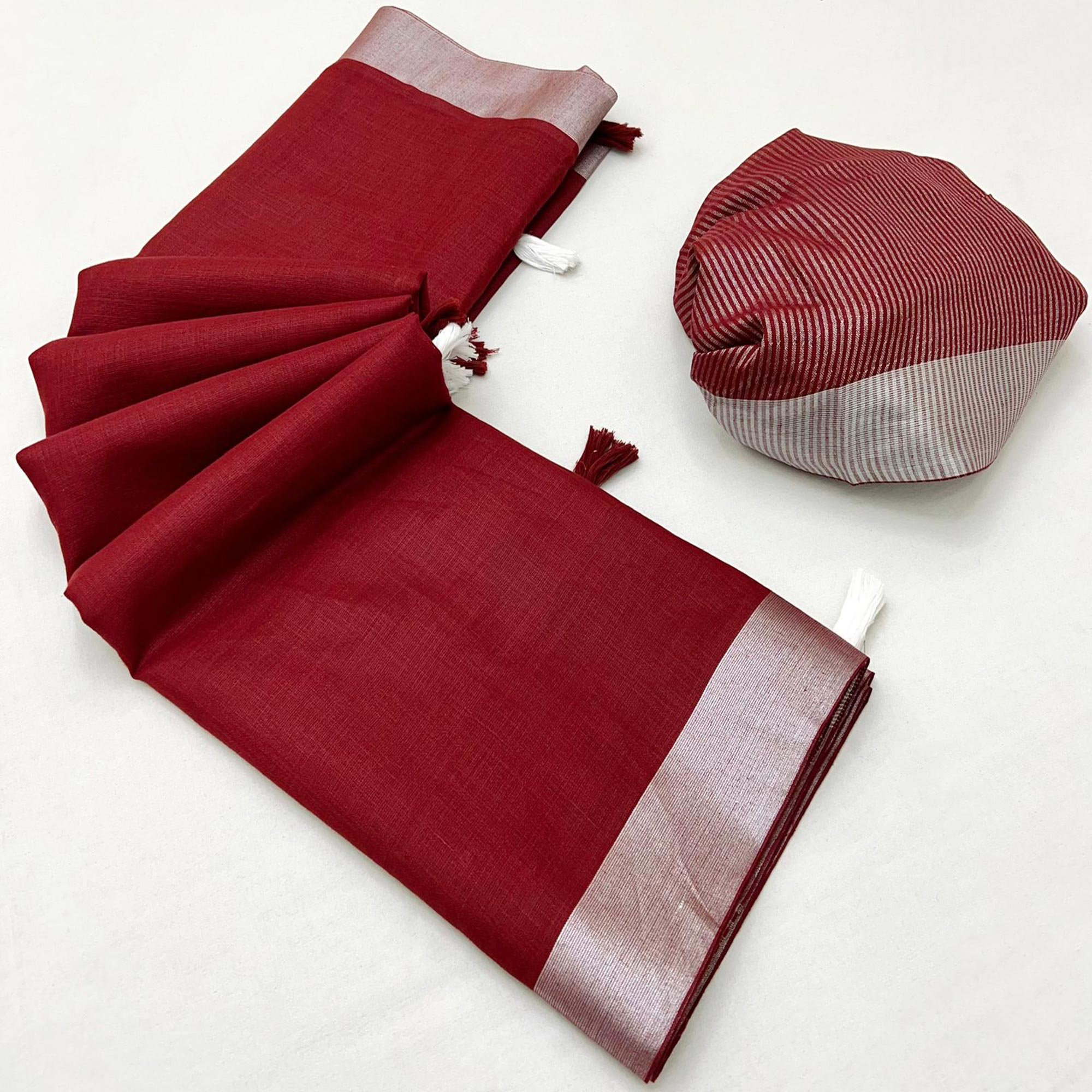 Maroon Solid Pure Linen Saree With Zari Woven Border