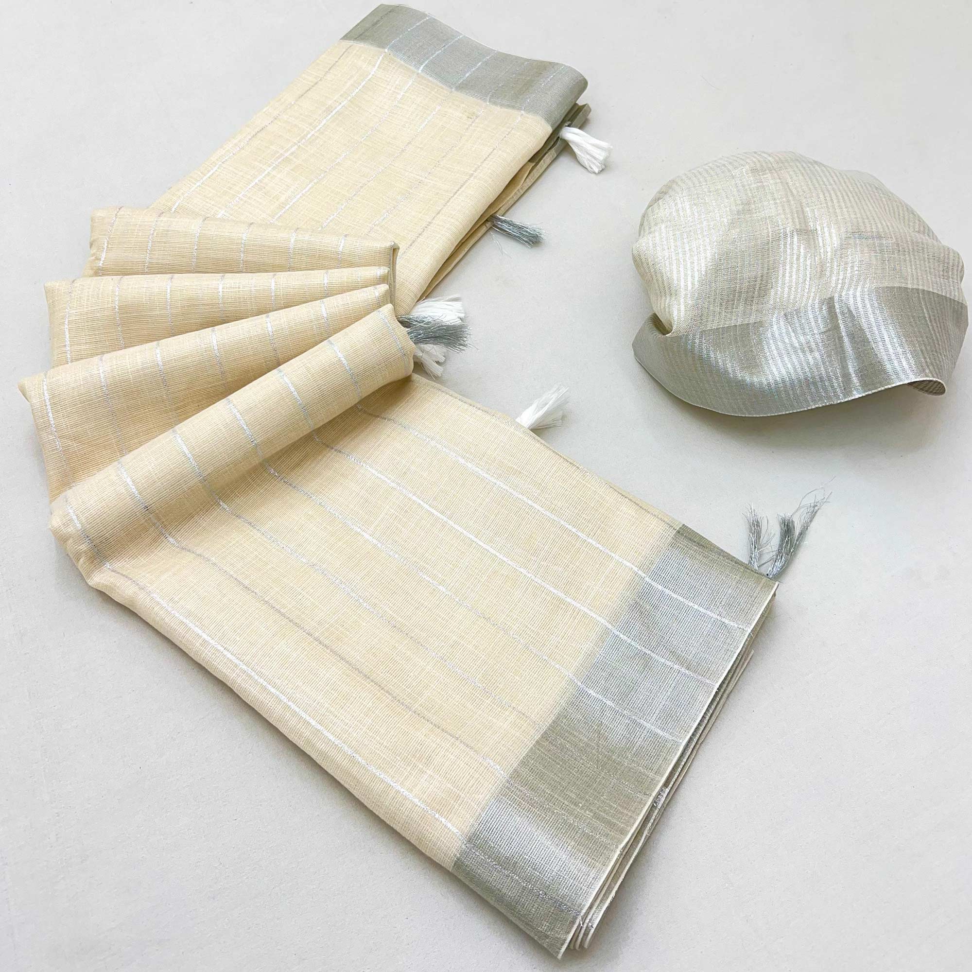 Offwhite Zari Woven Linen Saree With Tassels