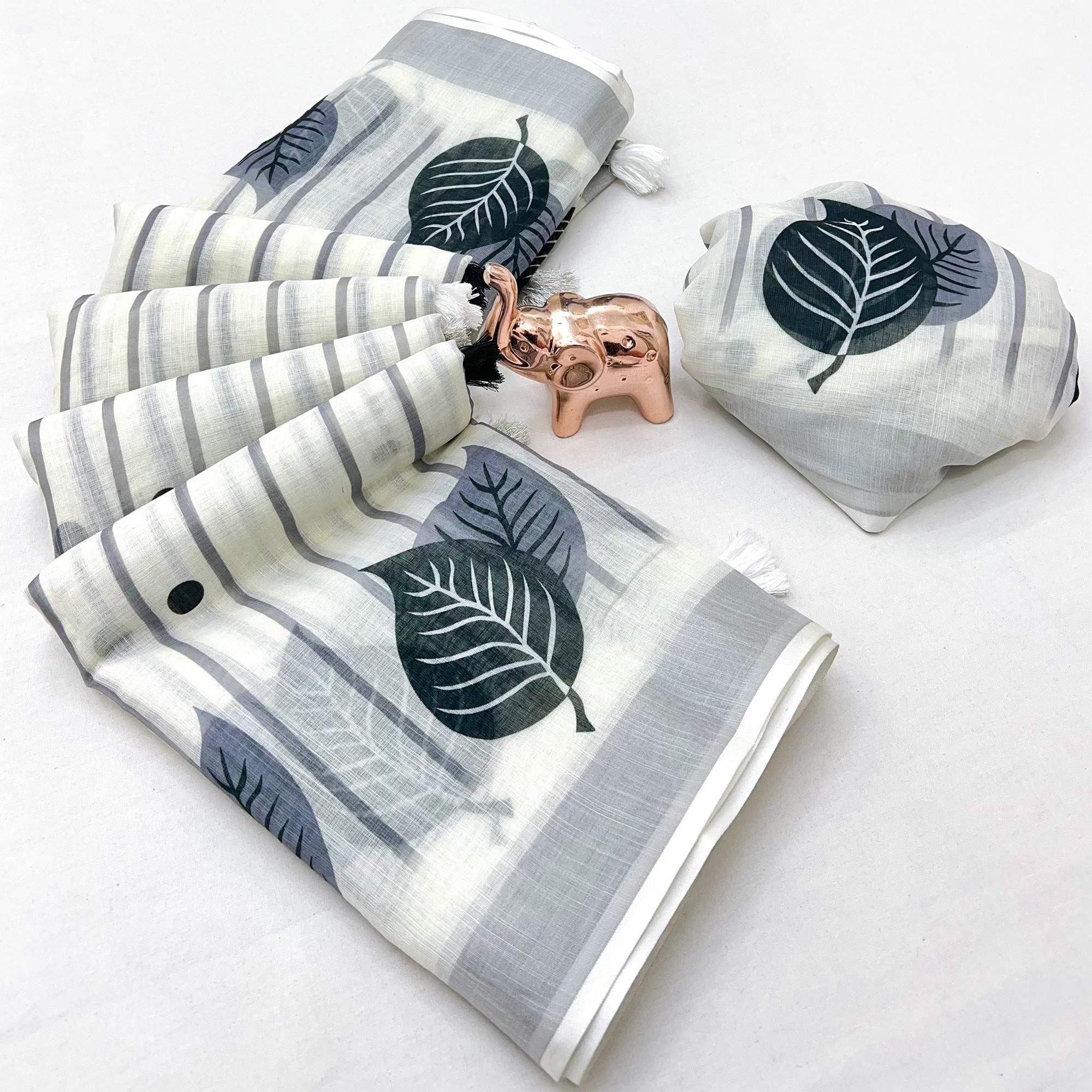 White Soft Linen Saree with Artistic Print Detailing