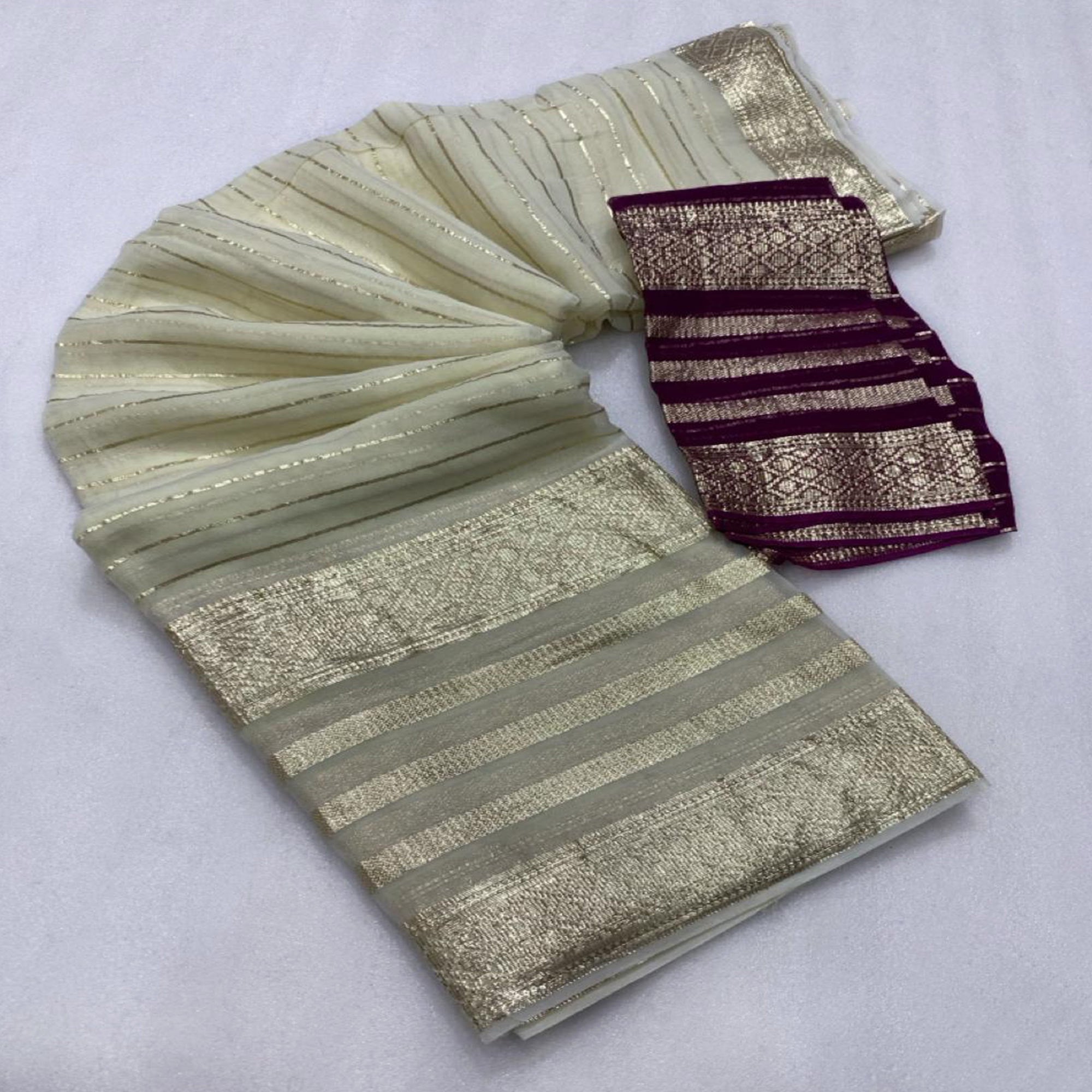 Offwhite & Purple Striped Zari Woven Viscose Saree