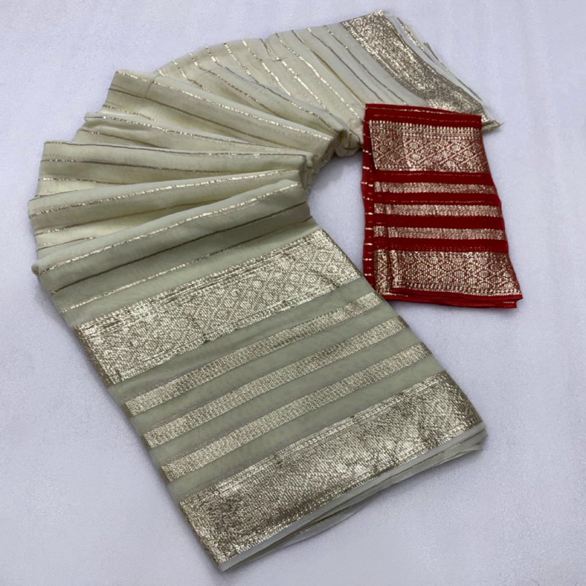 Offwhite & Red Striped Zari Woven Viscose Saree