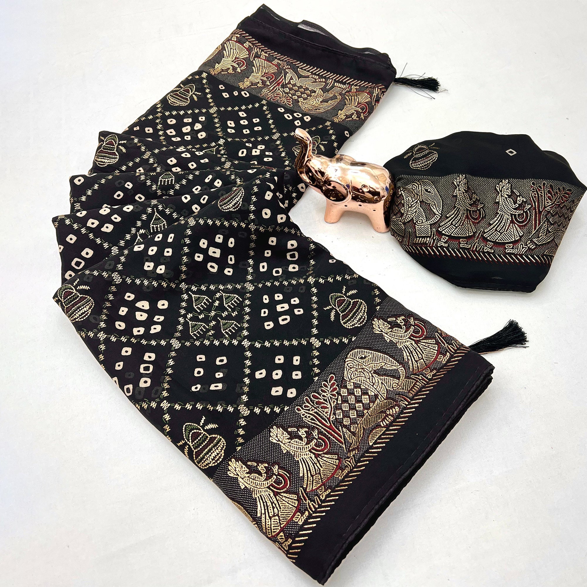 Elegant Black Bandhani Foil Printed Georgette Saree Highlighted With Soft Tassel Pallu