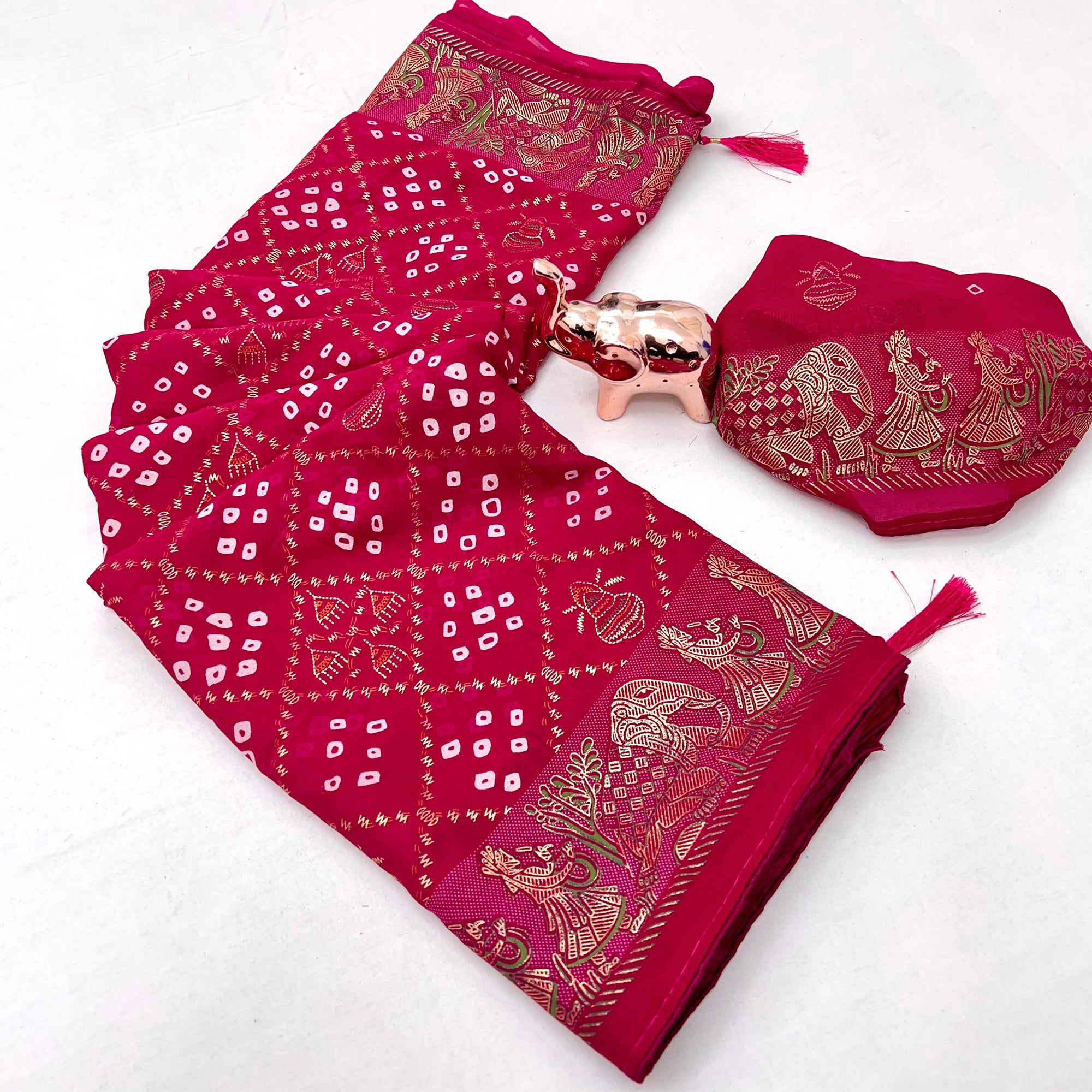 Elegant Pink Bandhani Foil Printed Georgette Saree Highlighted With Soft Tassel Pallu