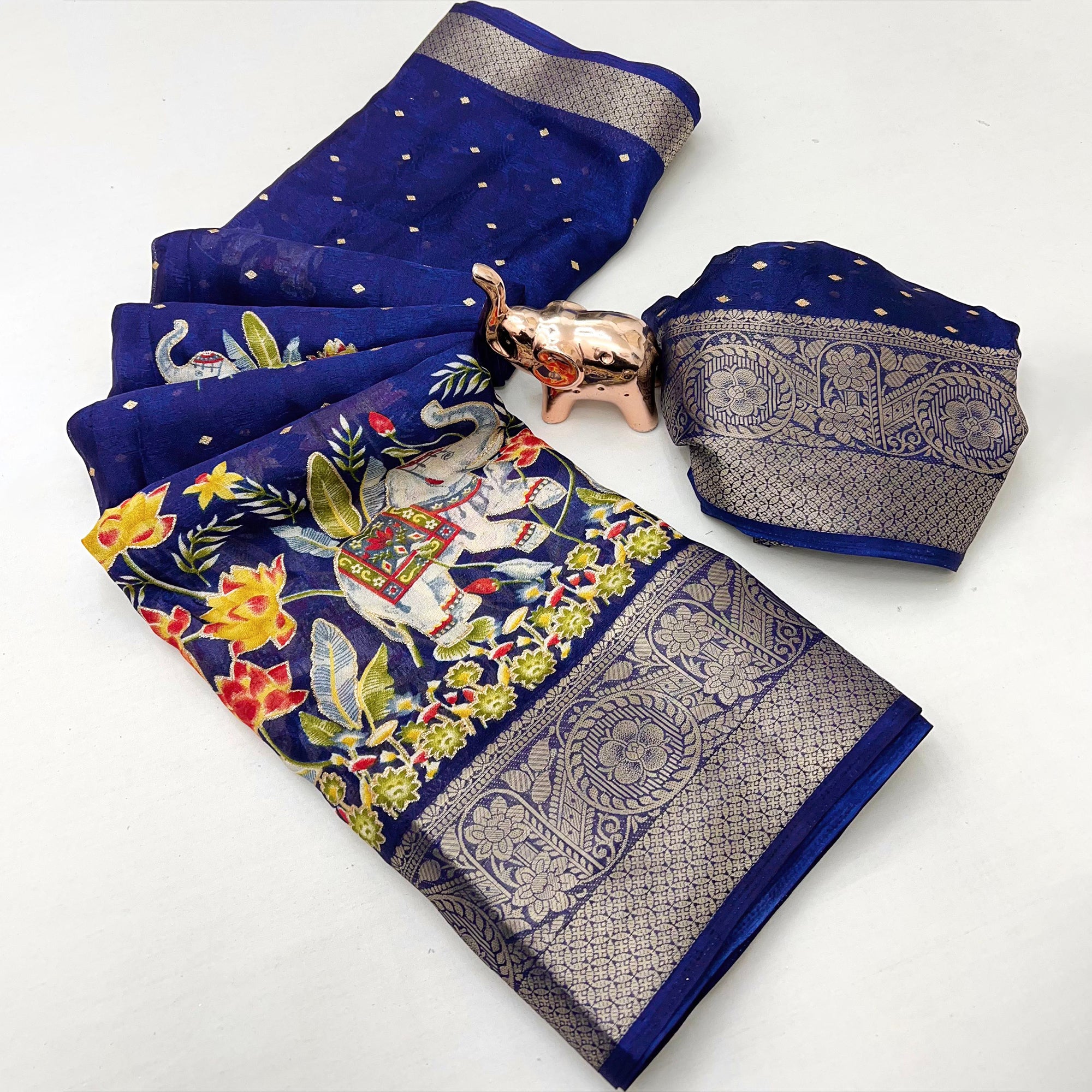 Elegant Navy Blue Elephant & Floral Printed Georgette Saree Accented With Weaving Zari Border