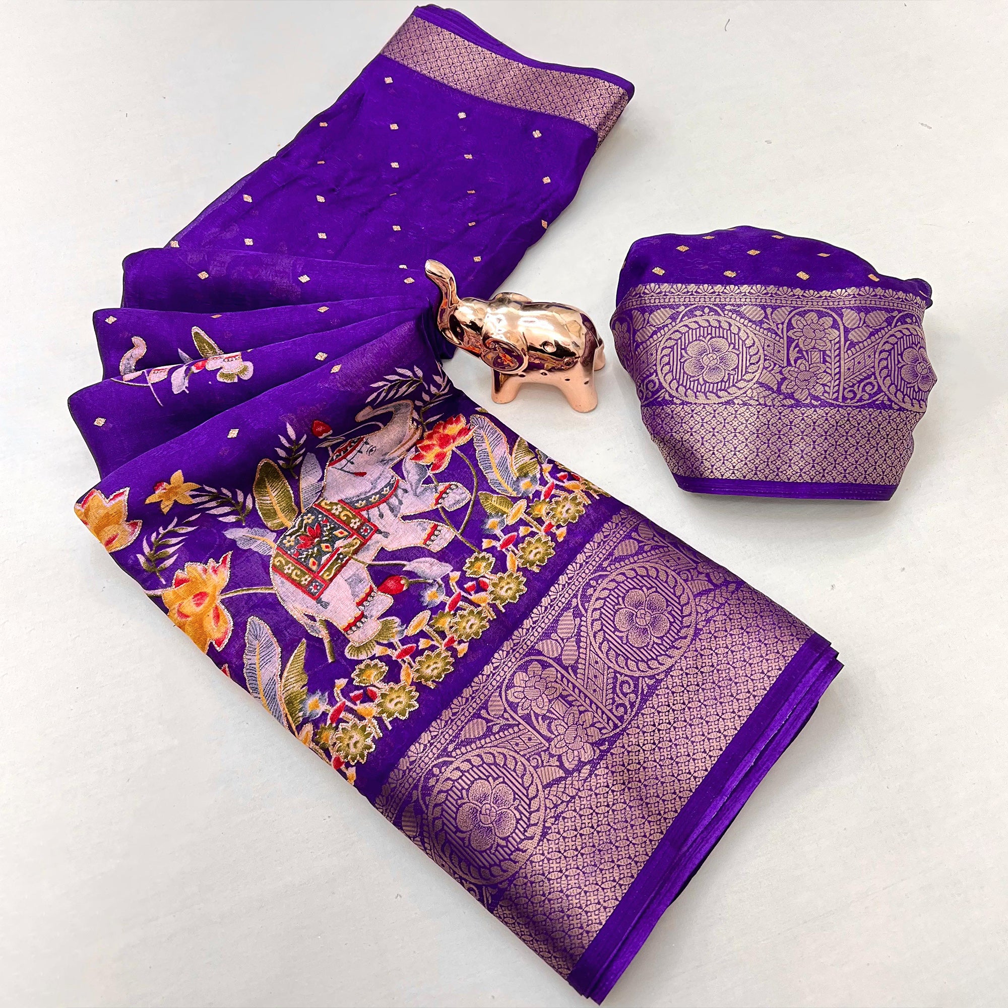 Elegant Royal Purple Elephant & Floral Printed Georgette Saree Accented With Weaving Zari Border