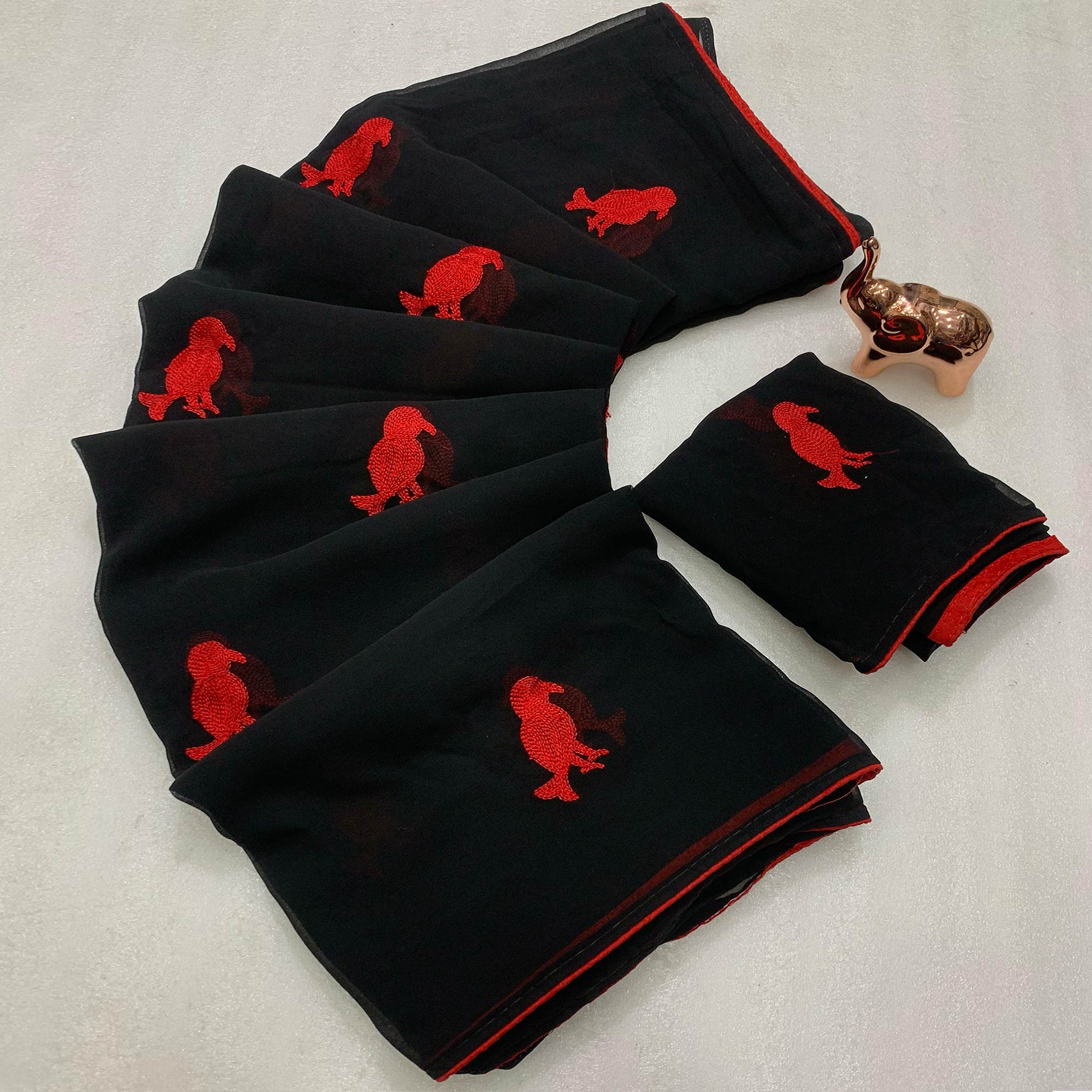 Black Georgette Saree Adorned With Elegant Bird Embroidery
