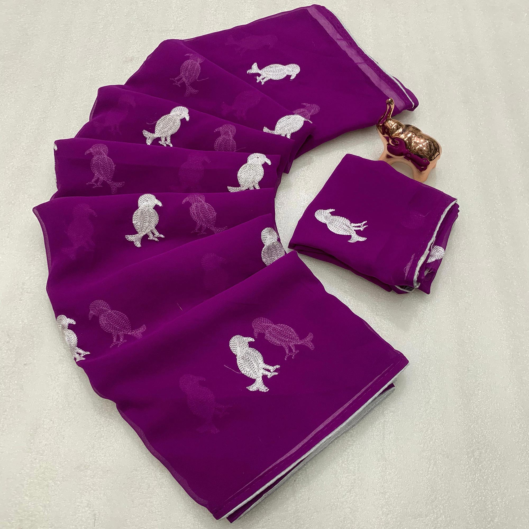 Dark Purple Georgette Saree Adorned With Elegant Bird Embroidery