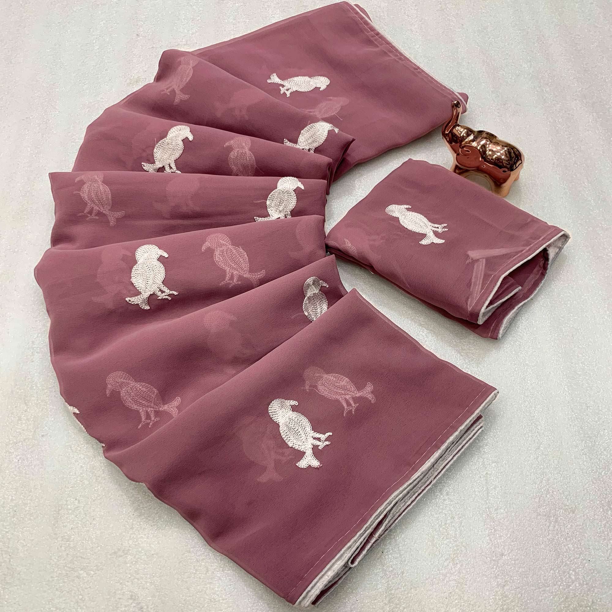 Mauve Georgette Saree Adorned With Elegant Bird Embroidery