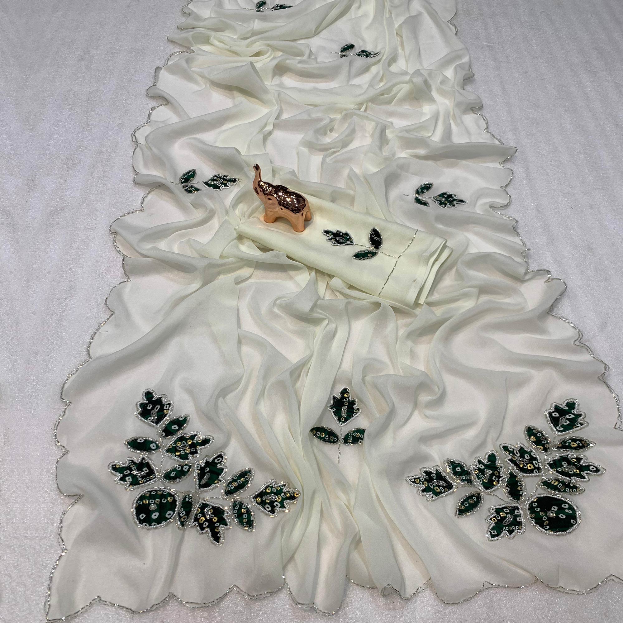 White & Green Partywear Georgette Saree with Delicate Stone & Bead Work