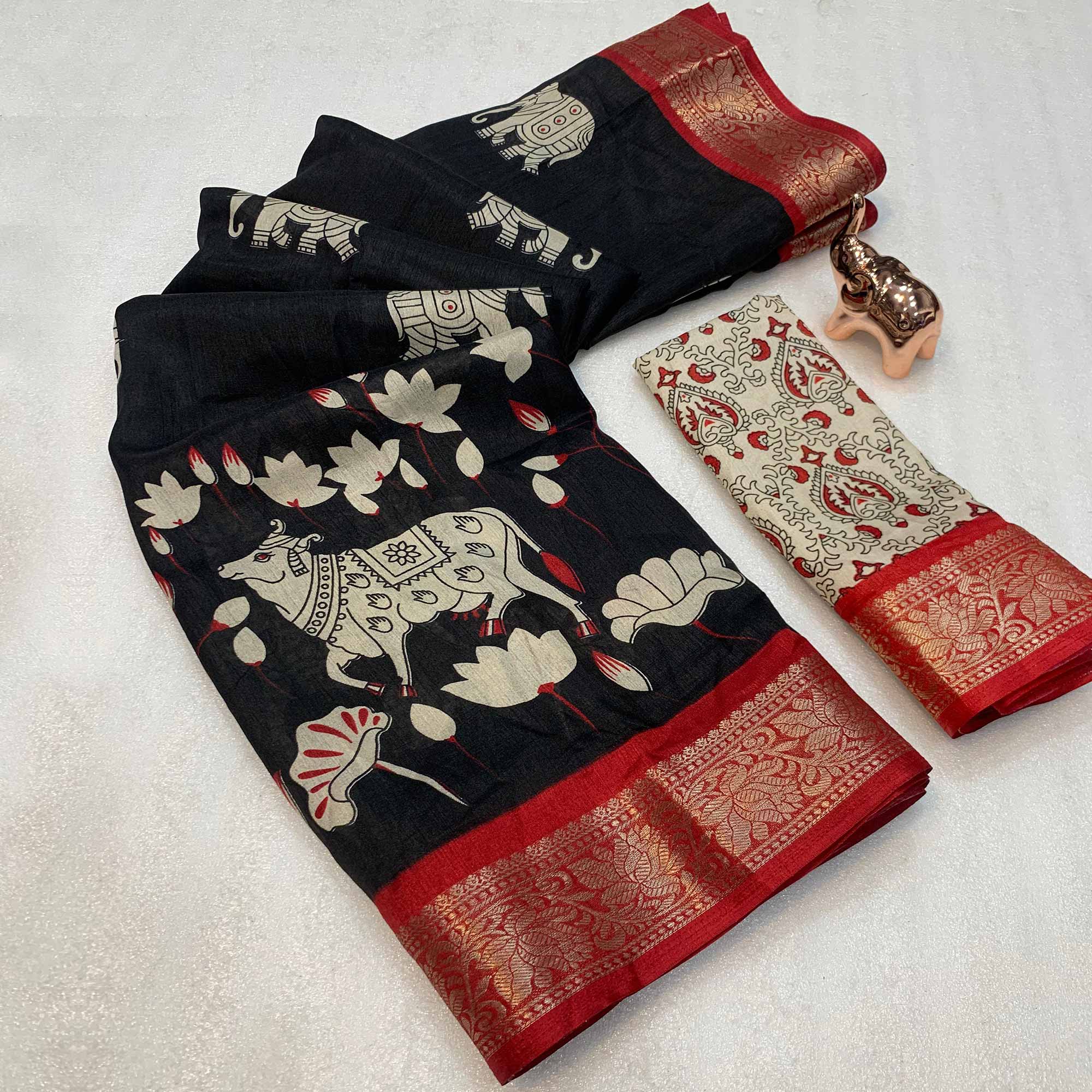 Heritage Inspired Black Mulmul Saree Featuring Pichwai Art Prints