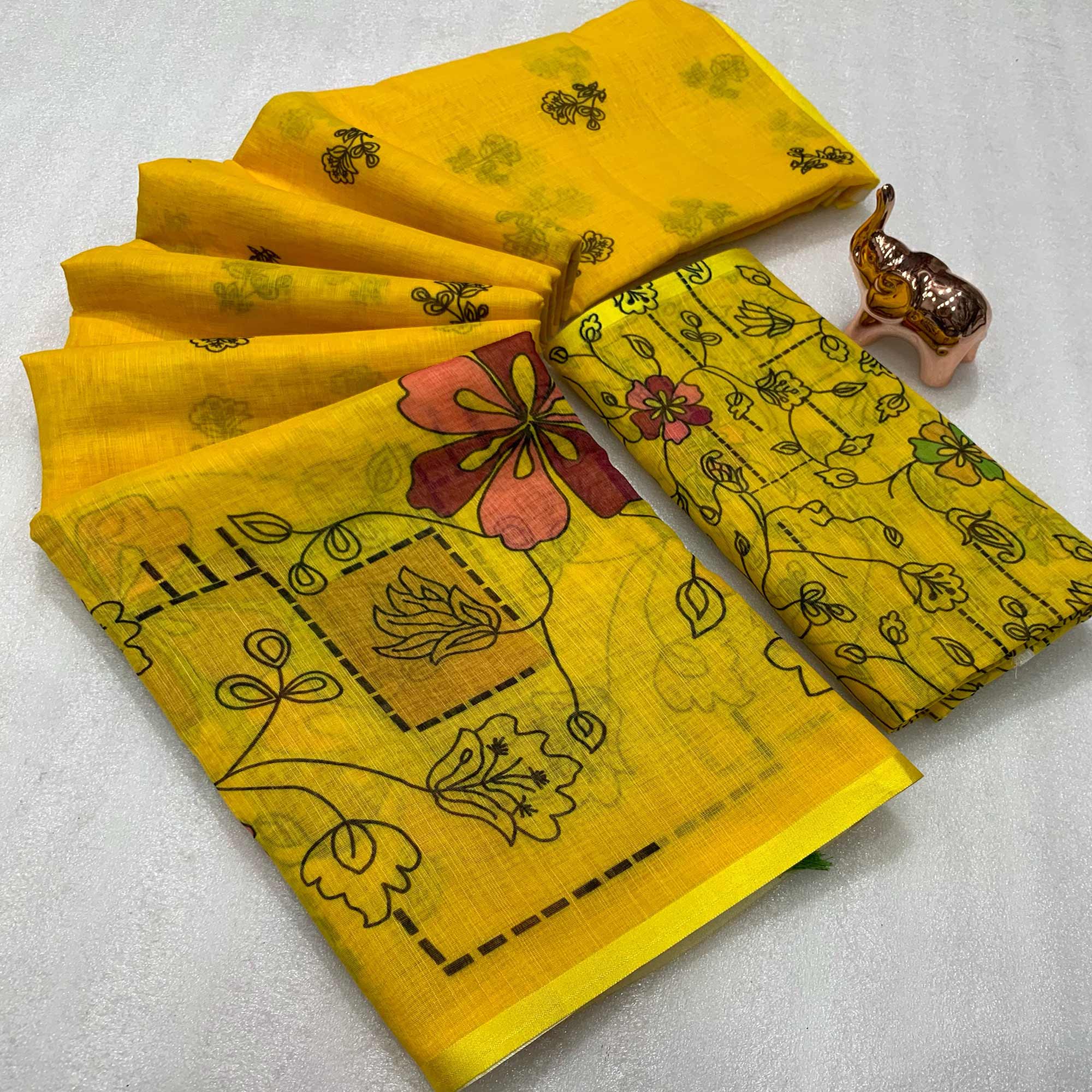 Mustard Floral Printed Linen Saree With Elegant Tassel Border