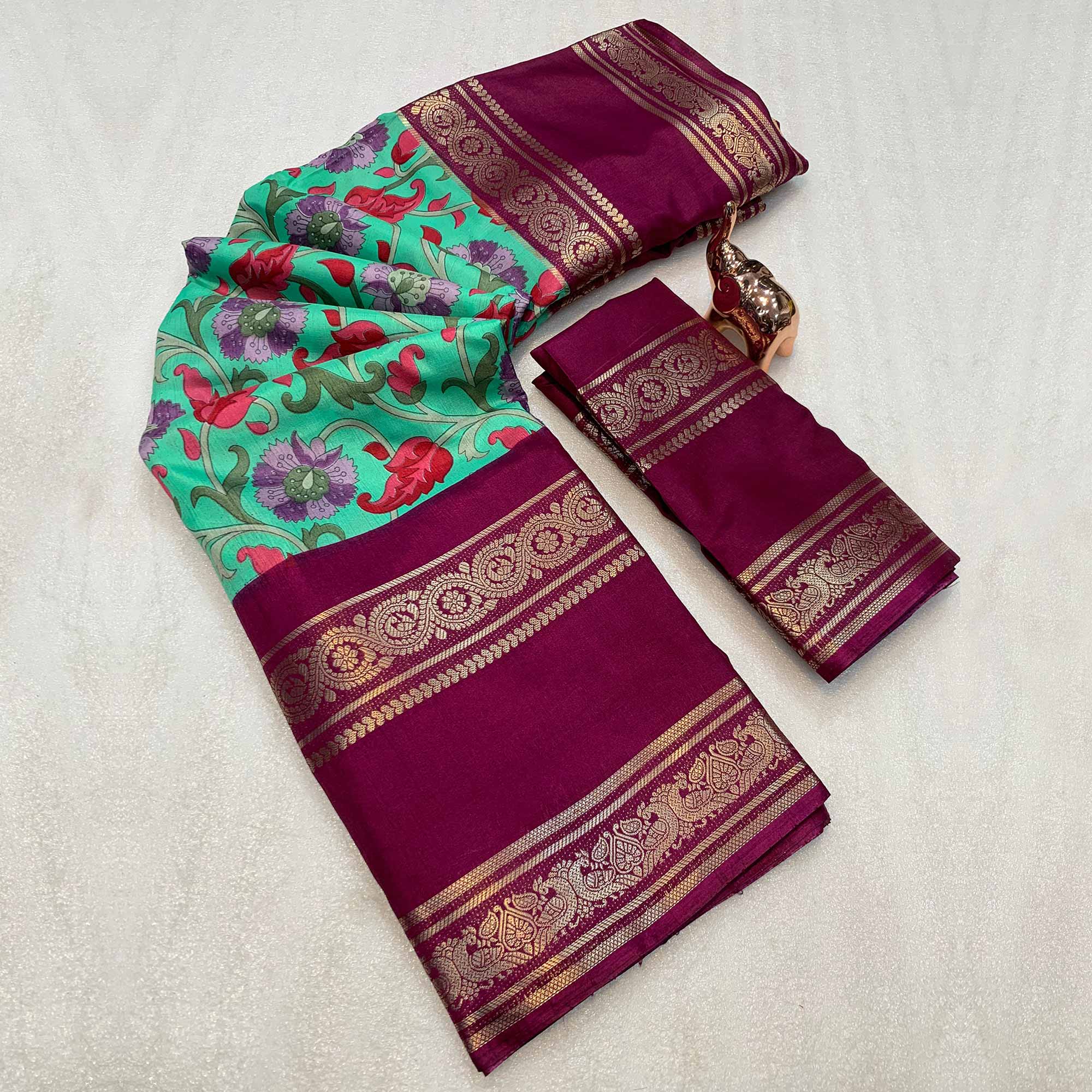 Sea Green Saree In Dola Silk Featuring Floral Kalamkari Print & Rich Jacquard Border