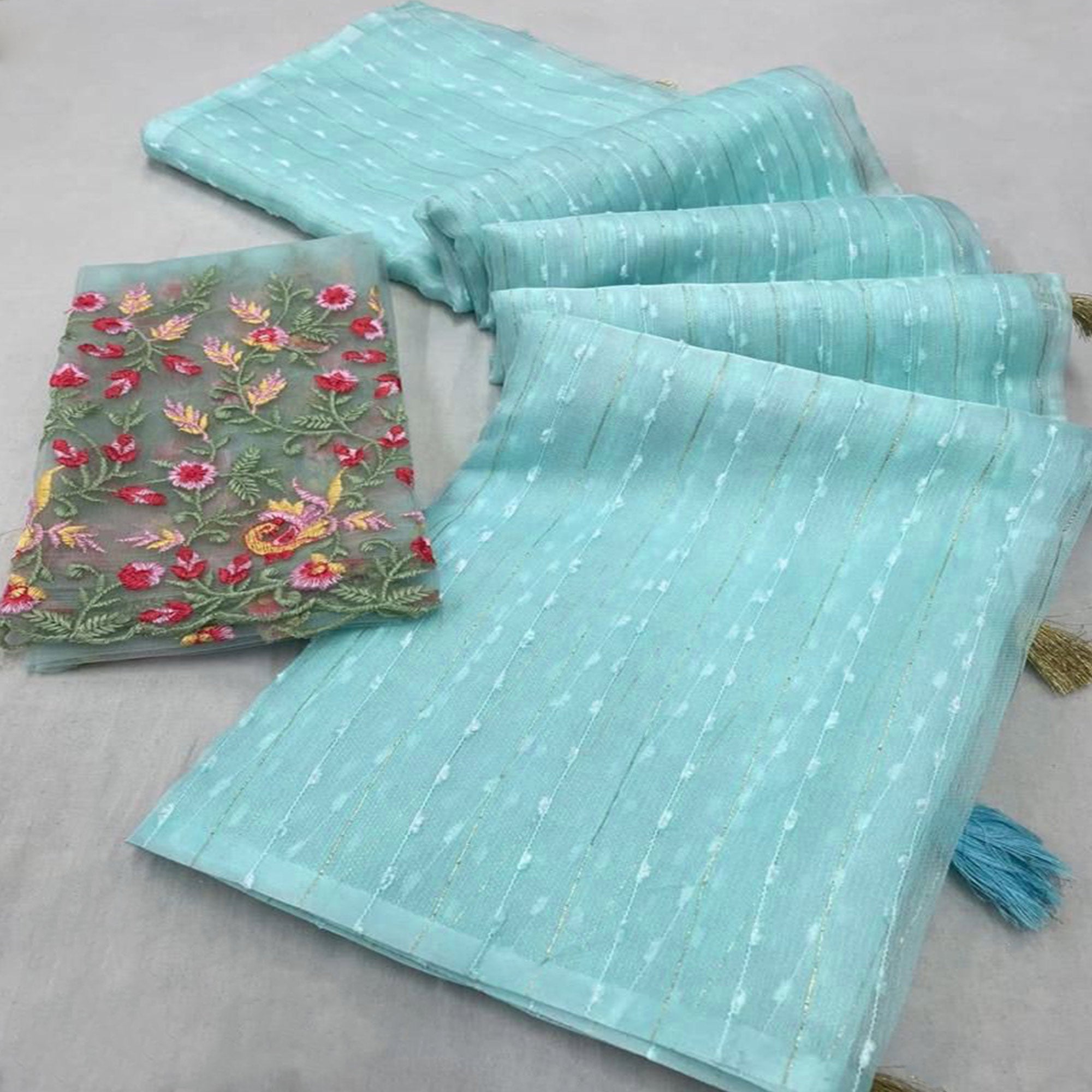 Blue Sequins Embroidered Organza Saree With Tassels