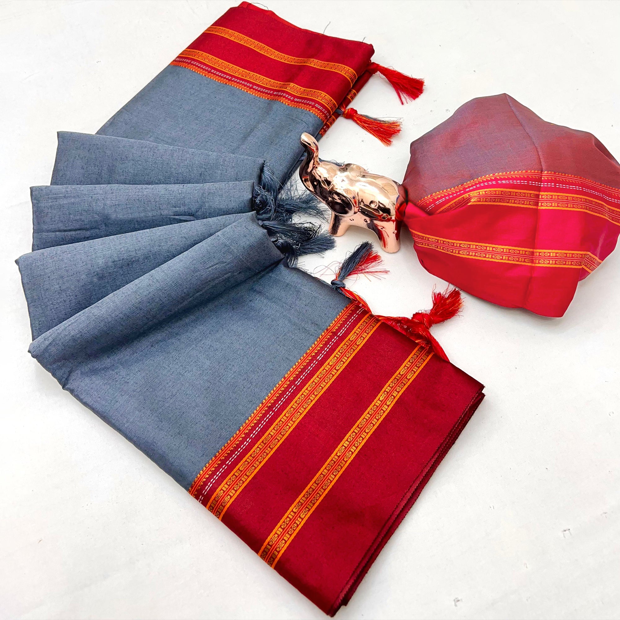 Classic Grey Solid Weaving Pure Silk Saree Accented With Woven Striped Pallu & Tassel Finish