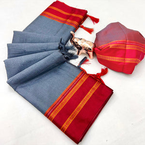 Classic Grey Solid Weaving Pure Silk Saree Accented With Woven Striped Pallu & Tassel Finish