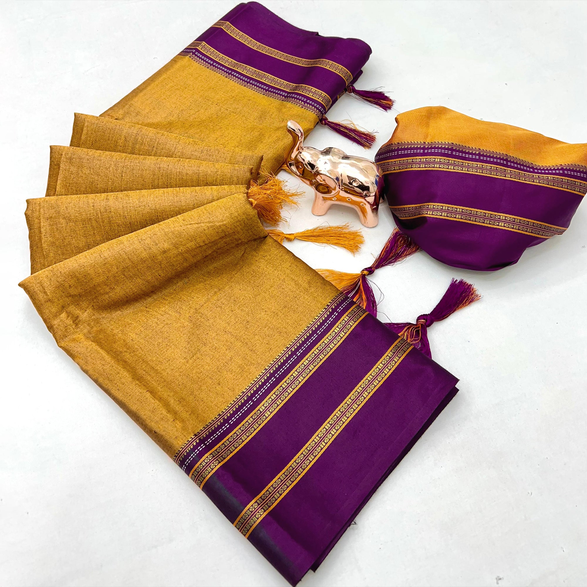 Classic Mustard Solid Weaving Pure Silk Saree Accented With Woven Striped Pallu & Tassel Finish