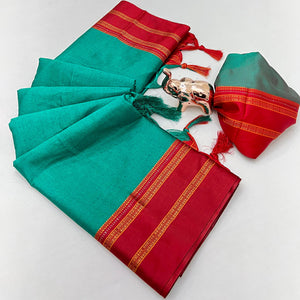 Classic Teal Green Solid Weaving Pure Silk Saree Accented With Woven Striped Pallu & Tassel Finish
